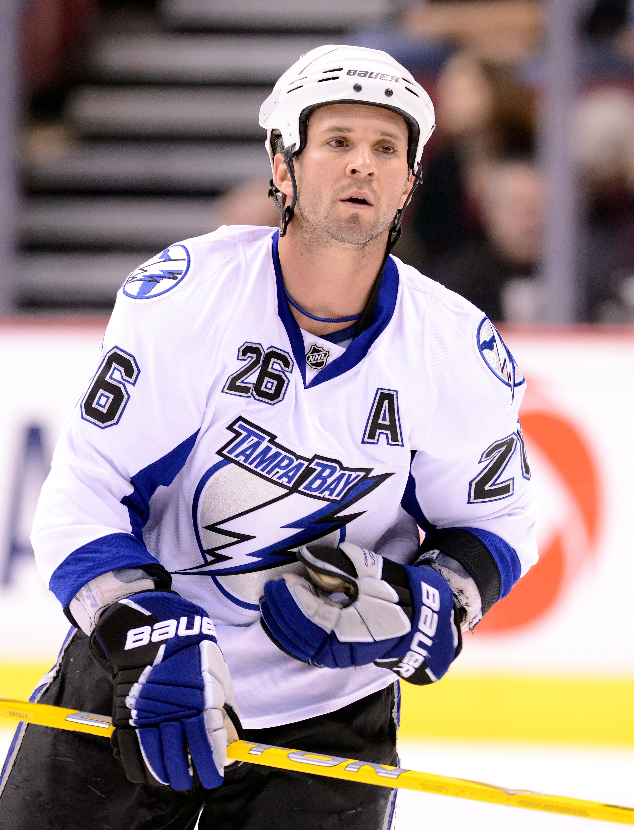 VANCOUVER, CANADA - DECEMBER 11: Martin St Louis #26 of the Tampa Bay Lightning skates during the pre-game warmup prior to NHL action on December 11, 2010 against the Vancouver Canucks at Rogers Arena in Vancouver, BC, Canada.  (Photo by Rich Lam/Getty Im