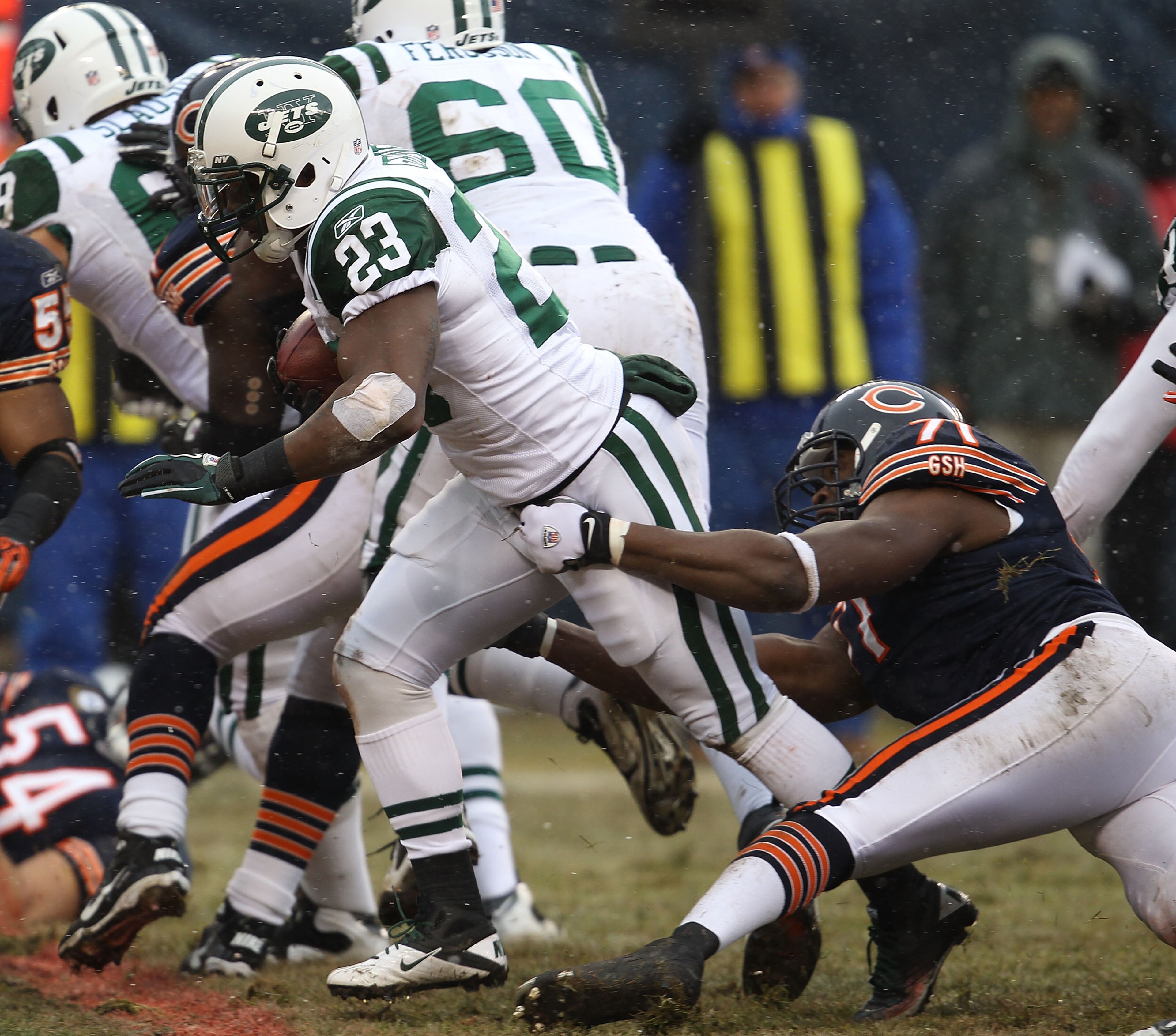 CHICAGO, IL - DECEMBER 26: Shonn Greene #23 of the New York Jets breaks away from Israel Idonije #71 of the Chicago Bears as he runs for a touchdown against the Chicago Bears at Soldier Field on December 26, 2010 in Chicago, Illinois. The Bears defeated t CHICAGO, IL - DECEMBER 26: Shonn Greene #23 of the New York Jets breaks away from Israel Idonije #71 of the Chicago Bears as he runs for a touchdown against the Chicago Bears at Soldier Field on December 26, 2010 in Chicago, Illinois. The Bears defeated t