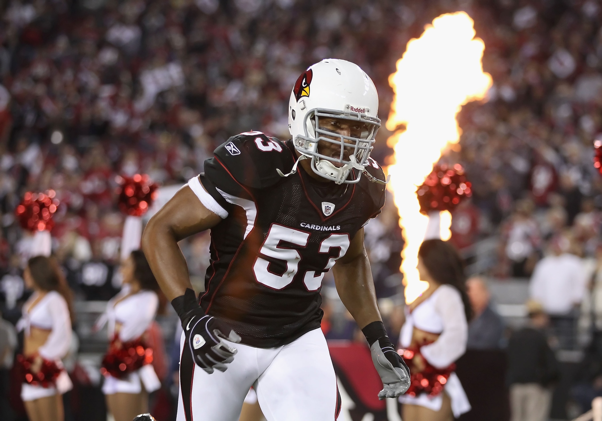 GLENDALE, AZ - NOVEMBER 29: Linebacker Clark Haggans #53 of the Arizona Cardinals is introduced before the NFL game against the San Francisco 49ers at the University of Phoenix Stadium on November 29, 2010 in Glendale, Arizona. The 49ers defeated the Ca GLENDALE, AZ - NOVEMBER 29: Linebacker Clark Haggans #53 of the Arizona Cardinals is introduced before the NFL game against the San Francisco 49ers at the University of Phoenix Stadium on November 29, 2010 in Glendale, Arizona. The 49ers defeated the Ca