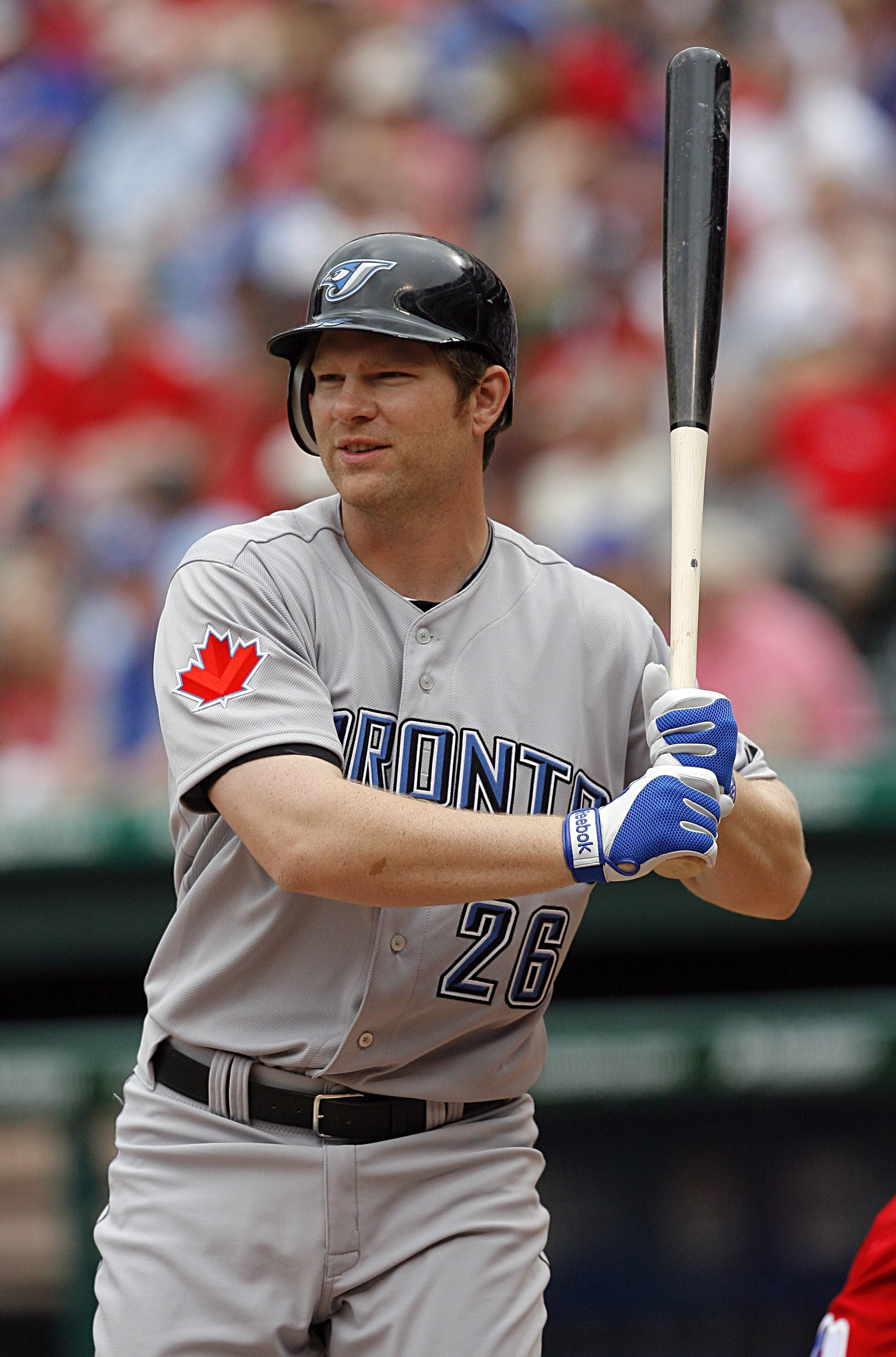 ARLINGTON, TX - APRIL 05:  Designated hitter Adam Lind #26 of the Toronto Blue Jays steps to the plate against the Texas Rangers on Opening Day at Rangers Ballpark on April 5, 2010 in Arlington, Texas. (Photo by Tom Pennington/Getty Images)
