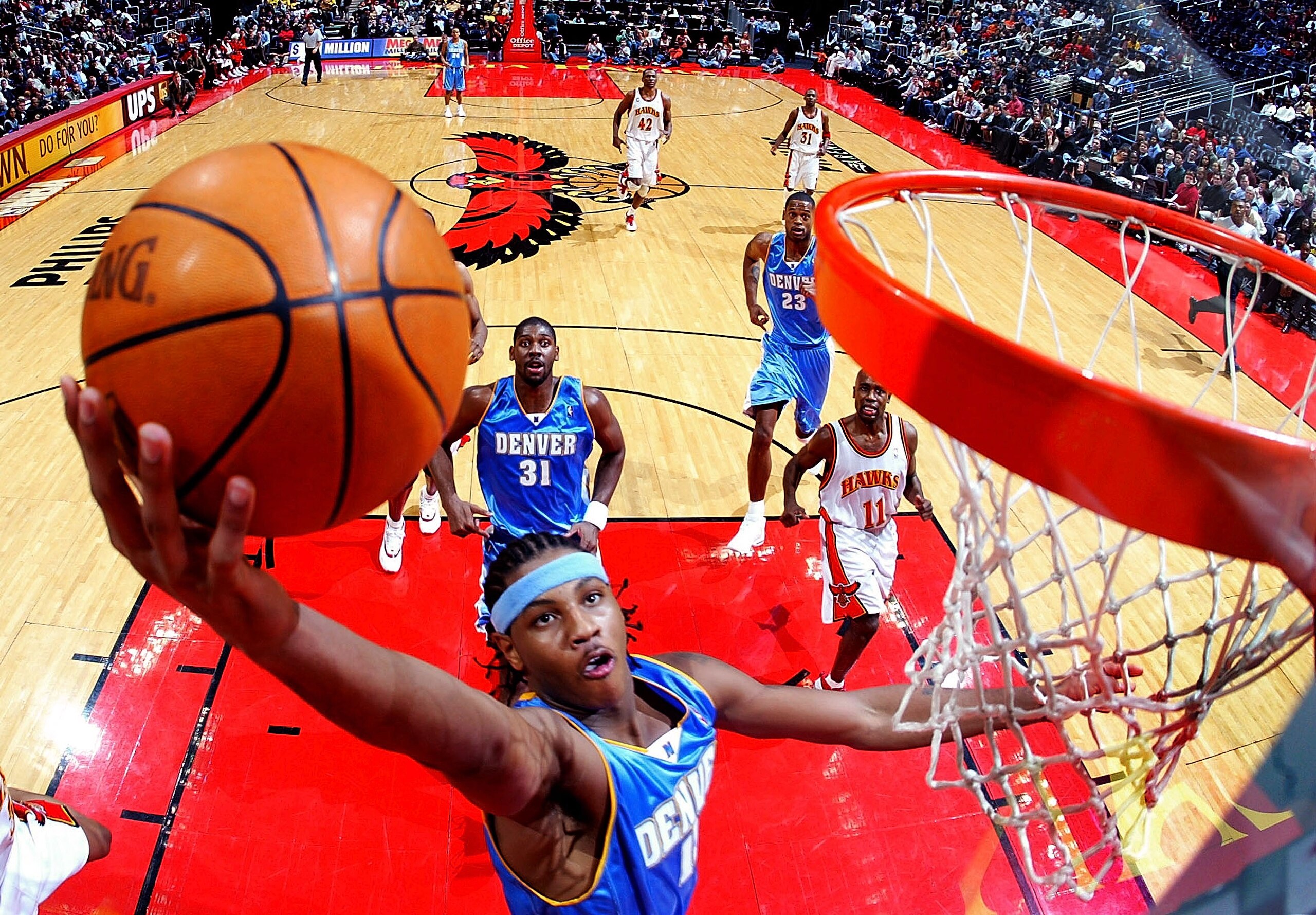 ATLANTA - DECEMBER 9:  Carmelo Anthony #15 of the Denver Nuggets shoots against the Atlanta Hawks on December 9, 2003 at Phillips Arena in Atlanta, Georgia.  NOTE TO USER: User expressly acknowledges and agrees that, by downloading and or using this photo