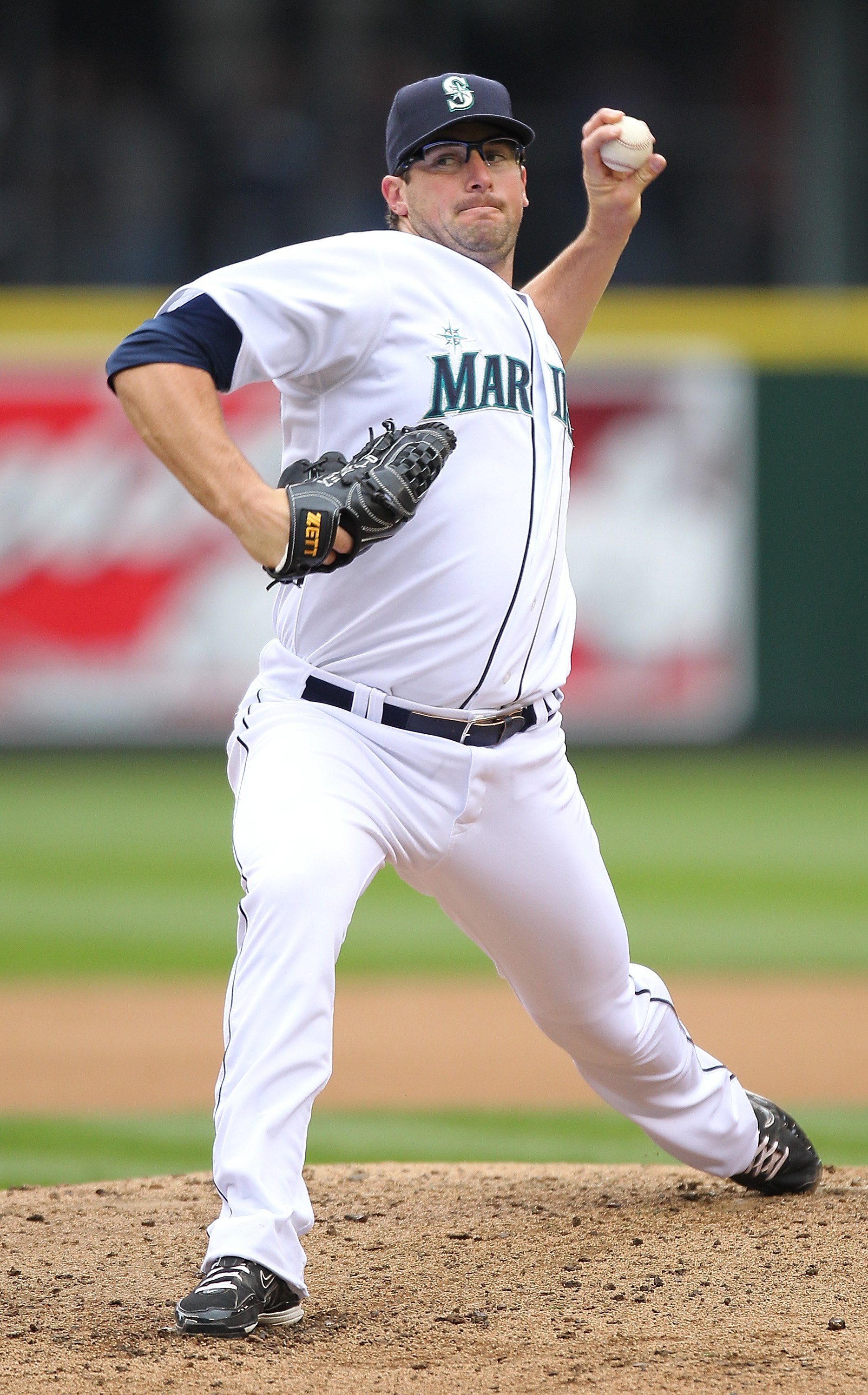 SEATTLE - APRIL 12:  Starting pitcher Ryan Rowland-Smith #18 of the Seattle Mariners pitches against the Oakland Athletics during the Mariners' home opener at Safeco Field on April 12, 2010 in Seattle, Washington. (Photo by Otto Greule Jr/Getty Images)