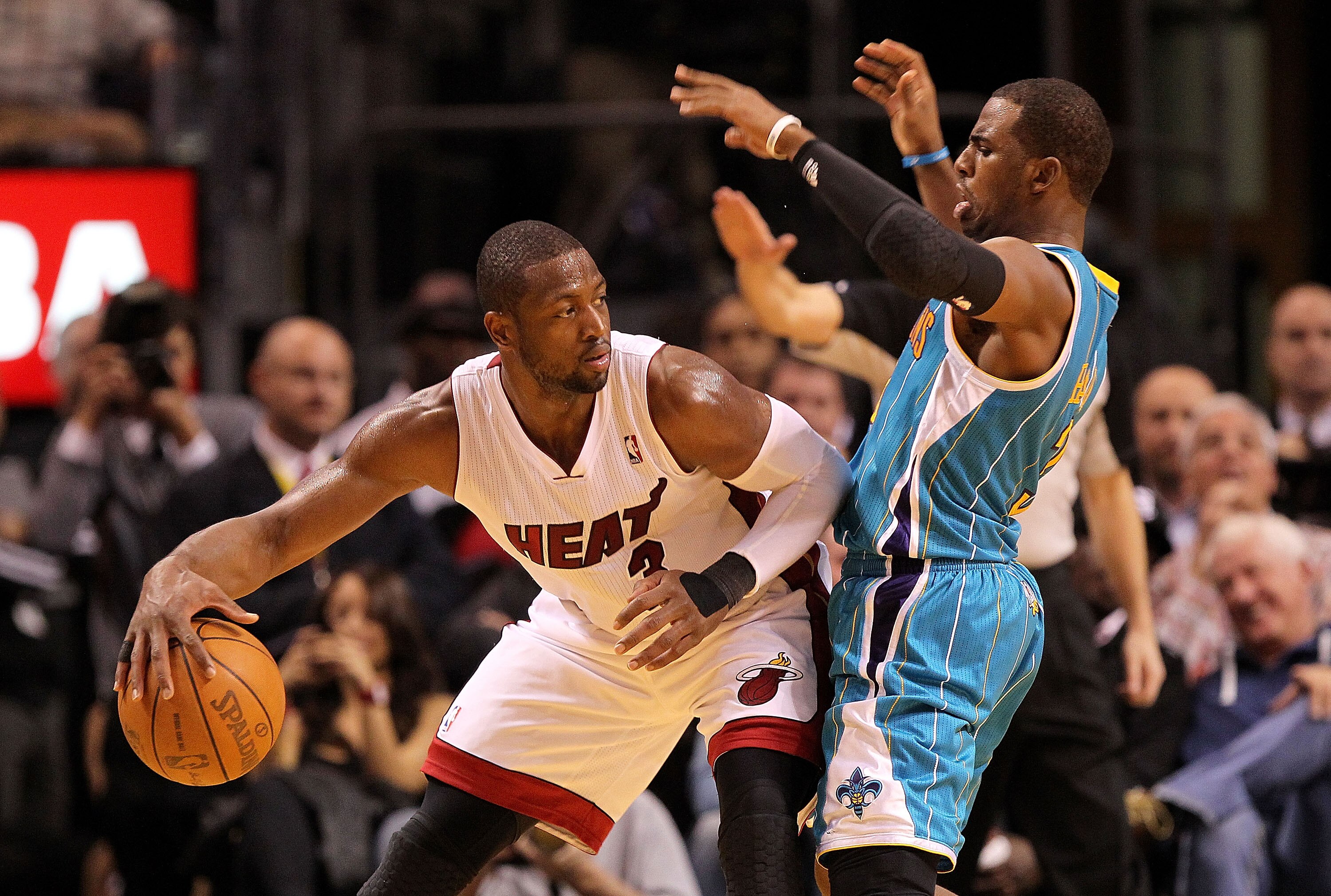 MIAMI, FL - DECEMBER 13:  Dwyane Wade #3 of the Miami Heat is guarded by Chris Paul #3 of the New Orleans Hornets during a game at American Airlines Arena on December 13, 2010 in Miami, Florida. NOTE TO USER: User expressly acknowledges and agrees that, b