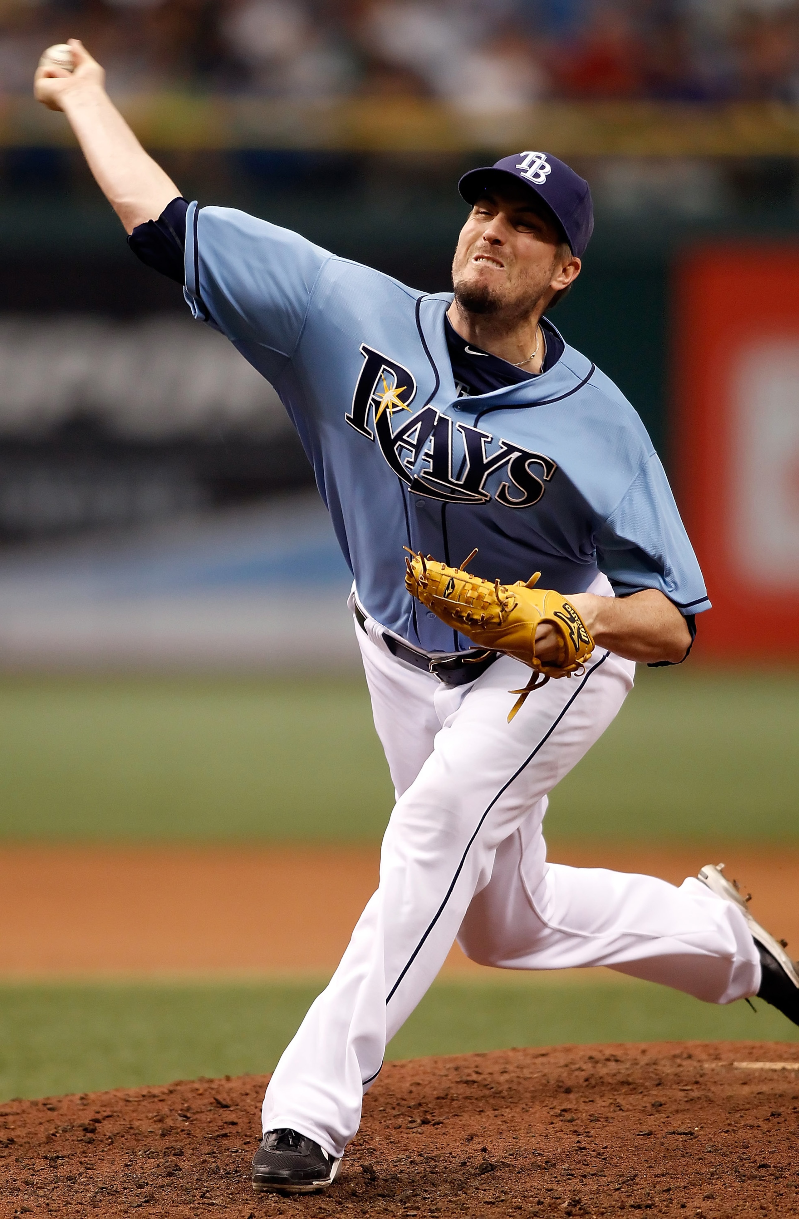 ST. PETERSBURG - AUGUST 01:  Pitcher Chad Qualls #55 of the Tampa Bay Rays pitches against the New York Yankees during the game at Tropicana Field on August 1, 2010 in St. Petersburg, Florida. Tampa Bay beat the Yankees 3-0.  (Photo by J. Meric/Getty Imag