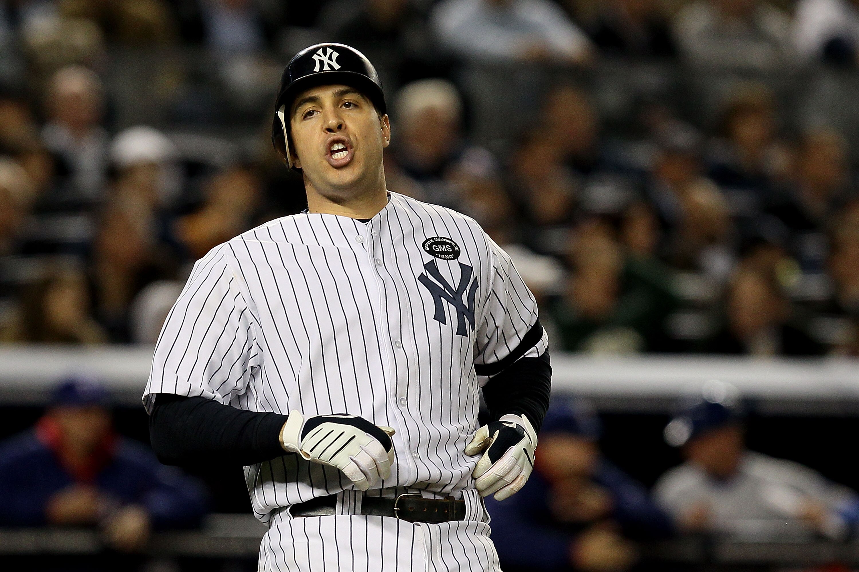 NEW YORK - OCTOBER 19:  Mark Teixeira #25 of the New York Yankees looks on after striking out against the Texas Rangers in Game Four of the ALCS during the 2010 MLB Playoffs at Yankee Stadium on October 19, 2010 in the Bronx borough of New York City.  (Ph