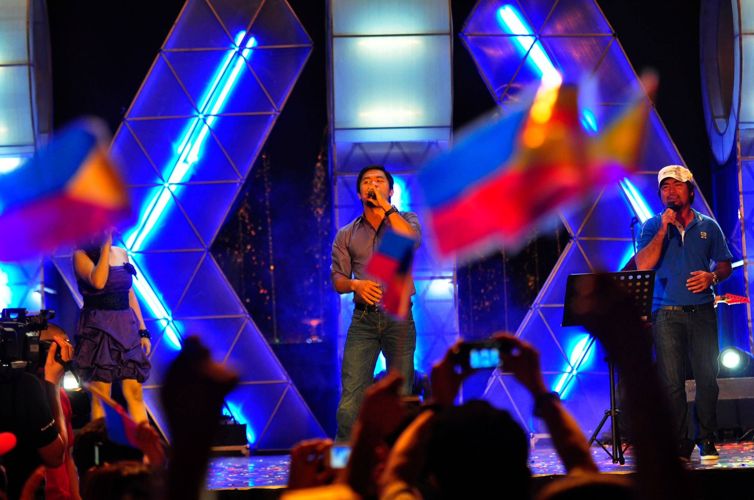 MANILA, PHILIPPINES - NOVEMBER 20:  Boxer and congressman, Manny Pacquiao performs with his band during a concert in Manila following his win of the WBC super welterweight crown against Mexican Antonio Margarito on November 20, 2010 in Manila, Philippines