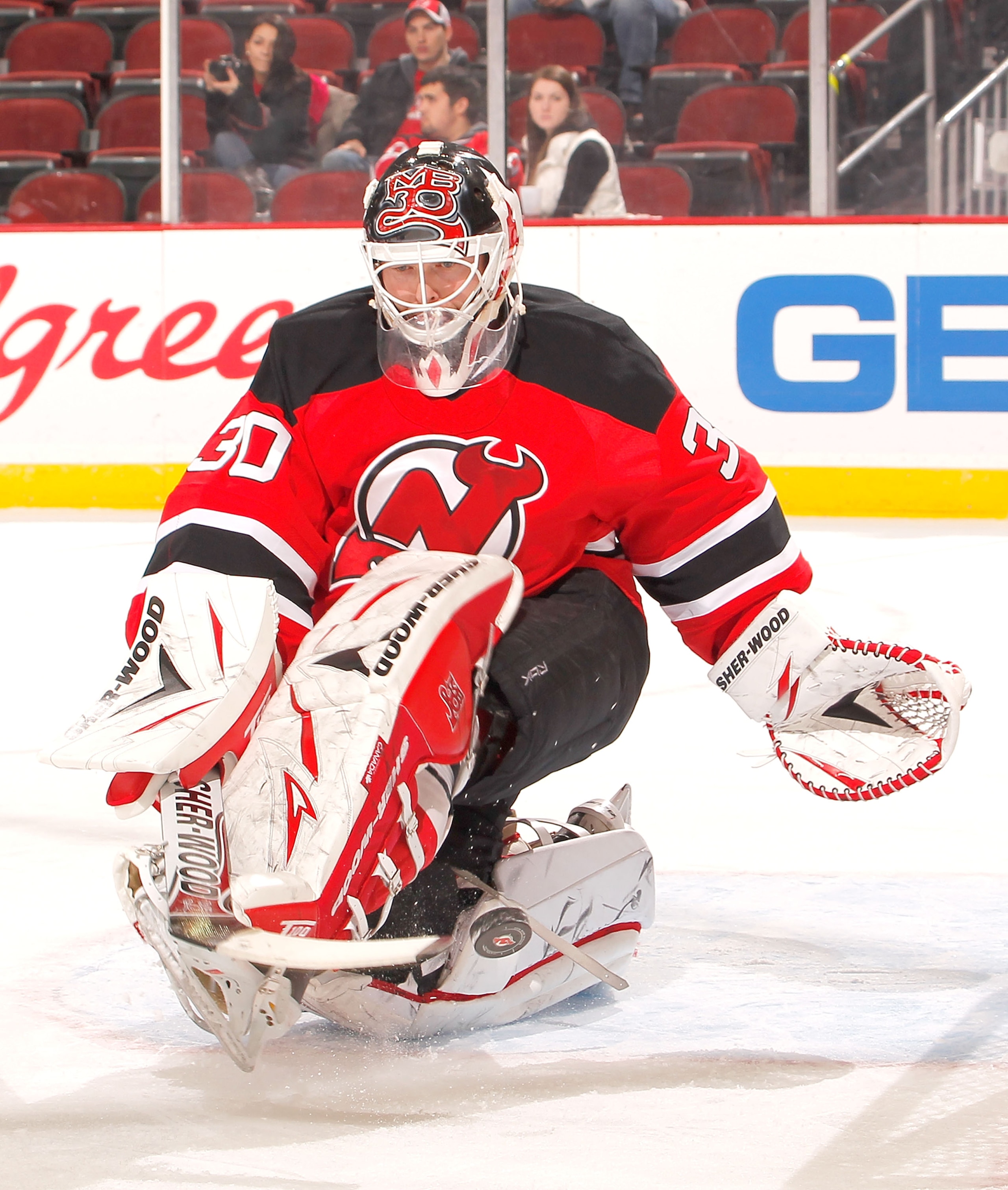 NEWARK, NJ - DECEMBER 26:  Goalie Martin Brodeur #30 of the New Jersey Devils makes a save against the Toronto Maple Leafs in the first period of an NHL hockey game at the Prudential Center on December 26, 2010 in Newark, New Jersey.  (Photo by Paul Beres
