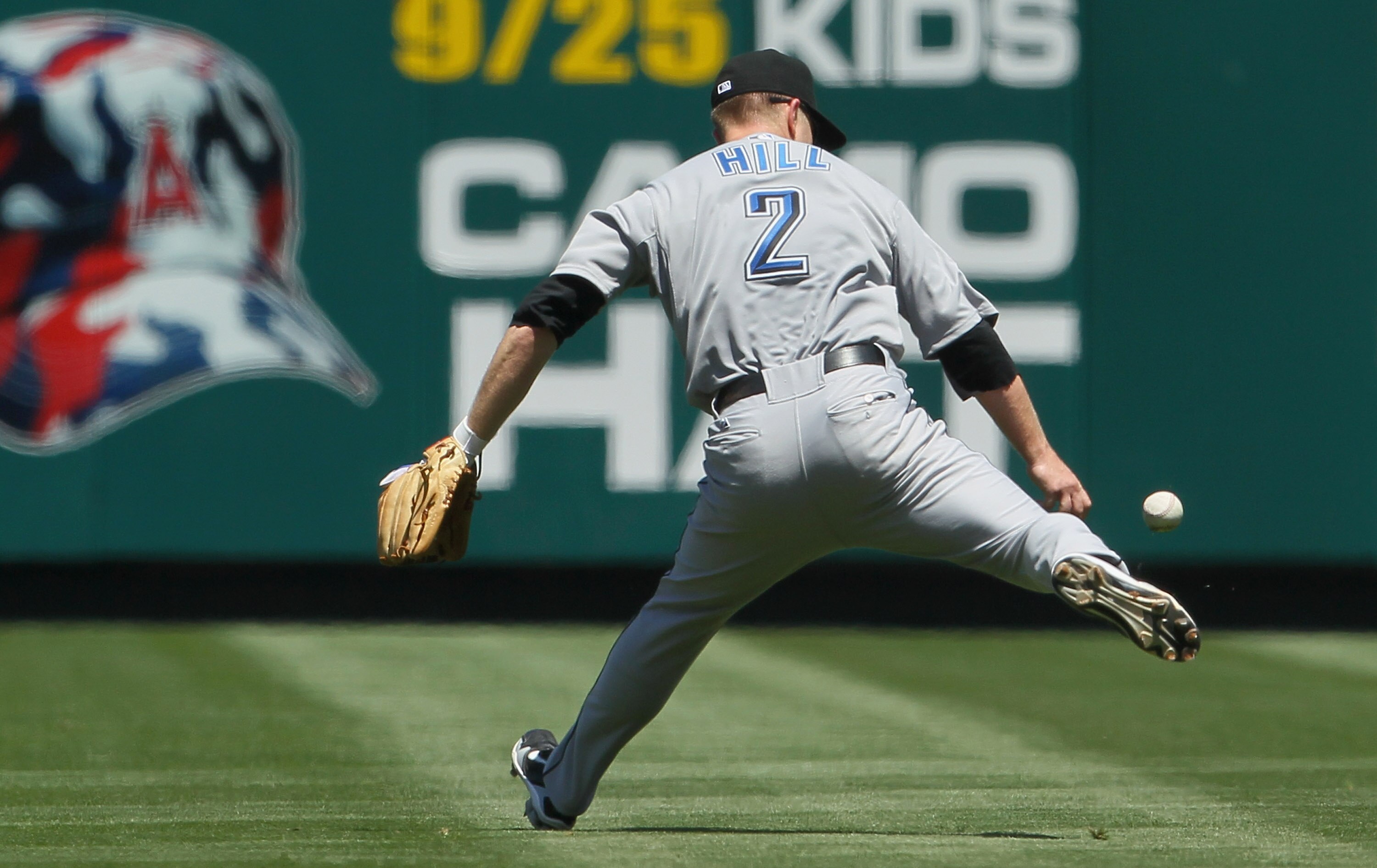 ANAHEIM, CA - AUGUST 15:  Second baseman Aaron Hill #2 of the Toronto Blue Jays misplays a pop fly by Torii Hunter of the Los Angeles Angels of Anaheim in the fourth inning at Angel Stadium on August 15, 2010 in Anaheim, California. The Blue Jays defeated