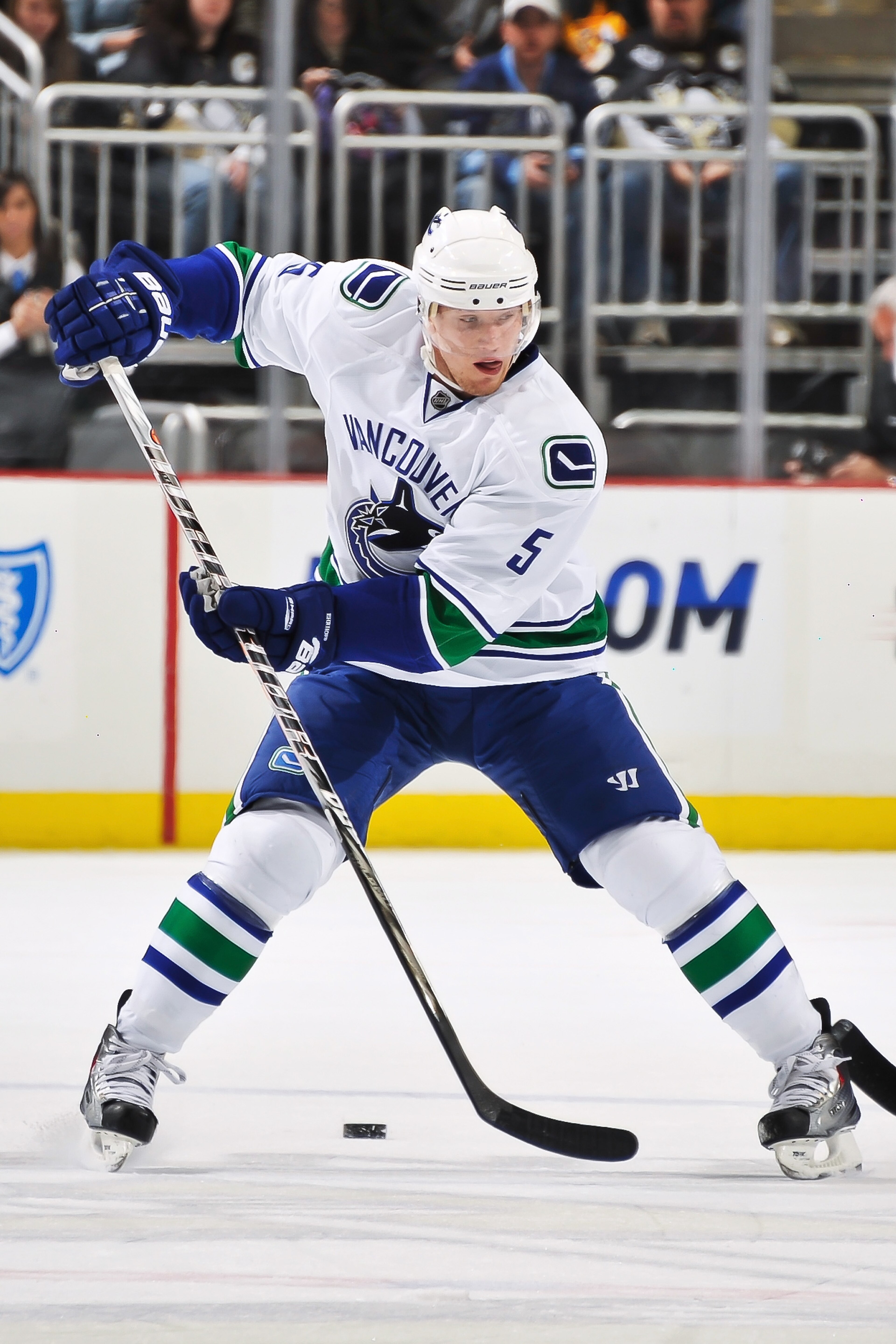 PITTSBURGH - NOVEMBER 17:  Christian Ehrhoff #5 of the Vancouver Canucks skates with the puck against the Pittsburgh Penguins on November 17, 2010 at Consol Energy Center in Pittsburgh, Pennsylvania.  (Photo by Jamie Sabau/Getty Images)