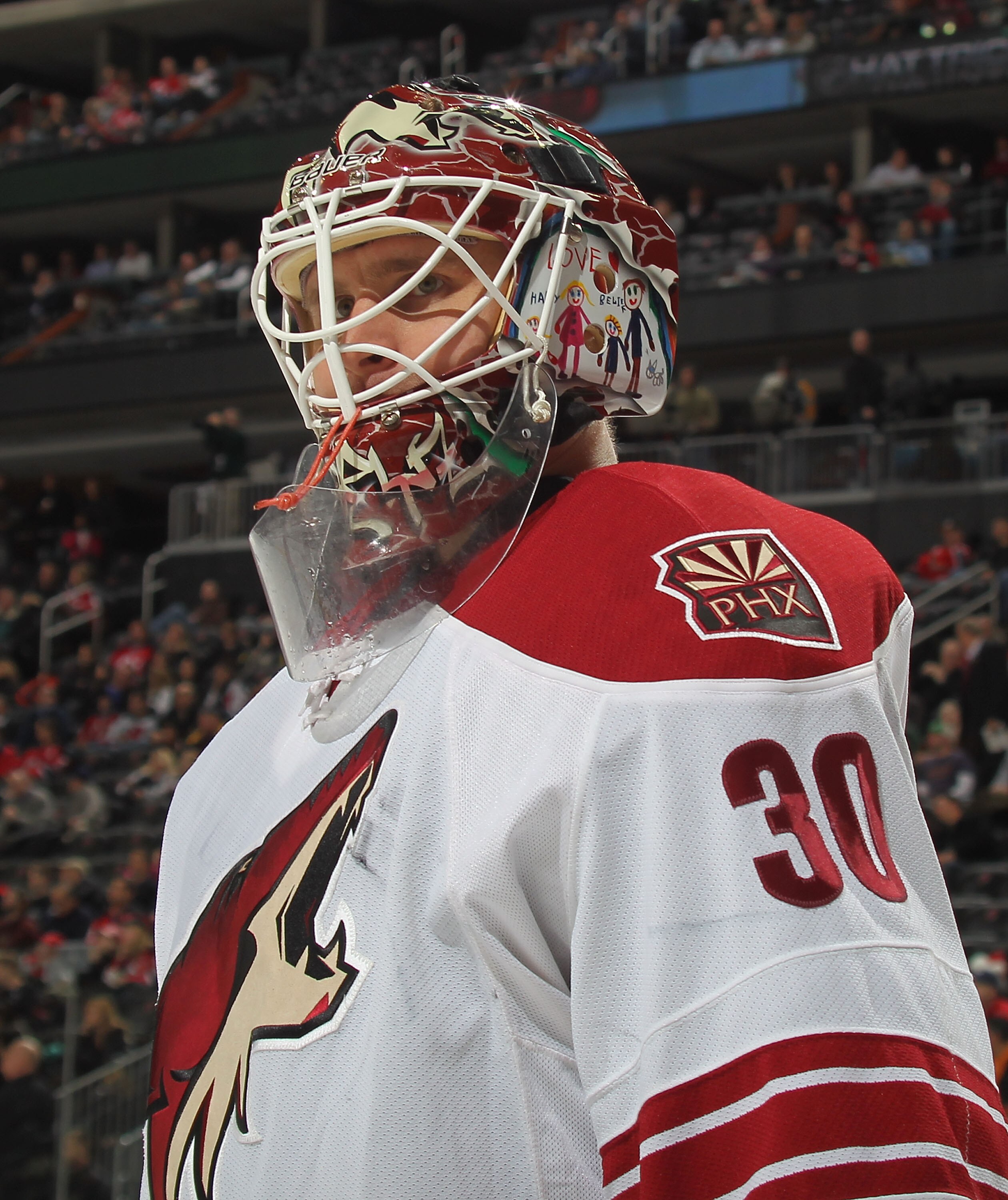 NEWARK, NJ - DECEMBER 15:  Goalie Ilya Bryzgalov #30 of the Phoenix Coyotes takes a break during a hockey game against the New Jersey Devils at the Prudential Center on December 15, 2010 in Newark, New Jersey.  (Photo by Paul Bereswill/Getty Images)