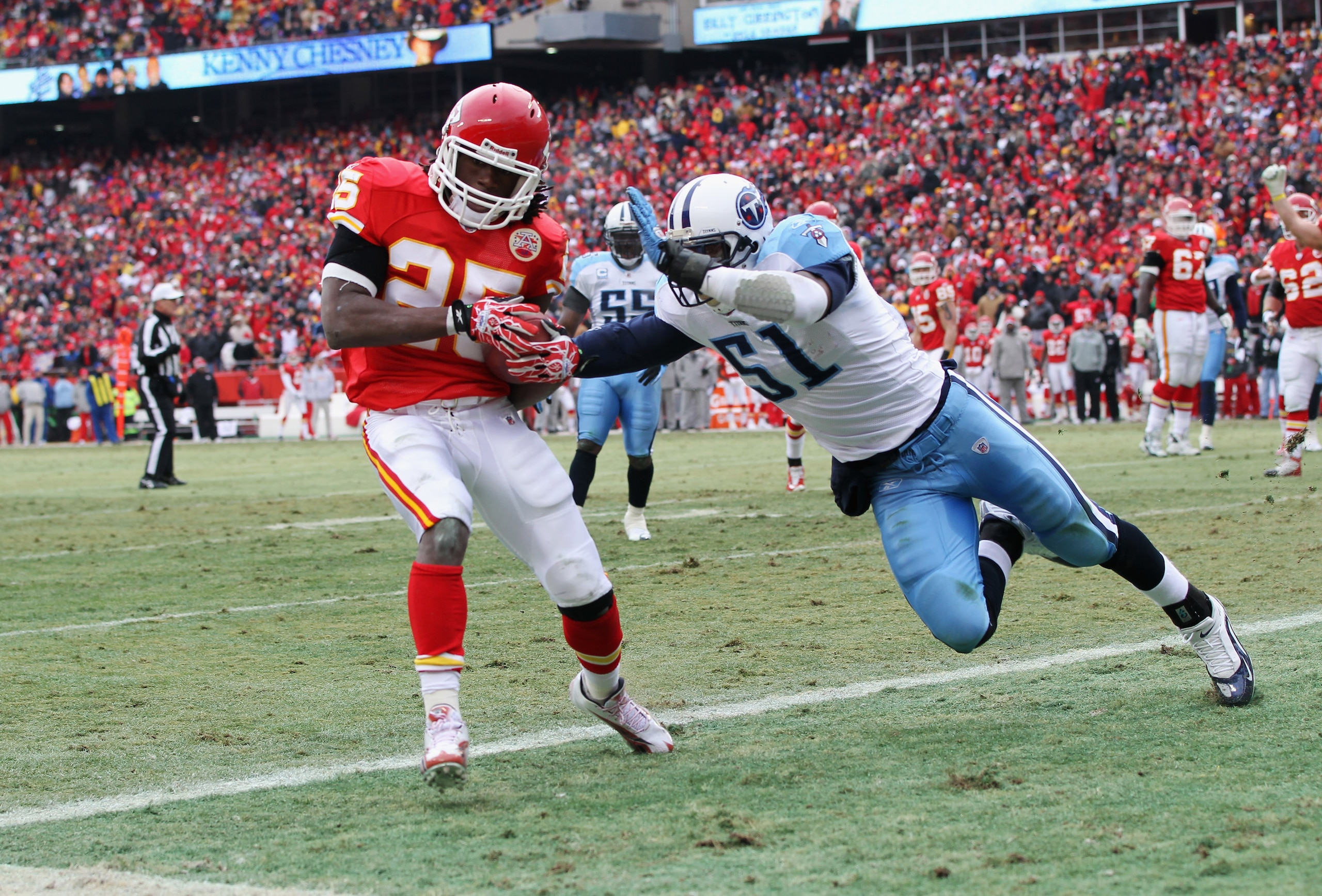 KANSAS CITY, MO - DECEMBER 26: Jamaal Charles #25 of the Kansas City Chiefs makes a catch in the endzone for a touchdown as Gerald McRath #51 of the Tennessee Titans defends during the game on December 26, 2010 at Arrowhead Stadium in Kansas City, Missou KANSAS CITY, MO - DECEMBER 26: Jamaal Charles #25 of the Kansas City Chiefs makes a catch in the endzone for a touchdown as Gerald McRath #51 of the Tennessee Titans defends during the game on December 26, 2010 at Arrowhead Stadium in Kansas City, Missou