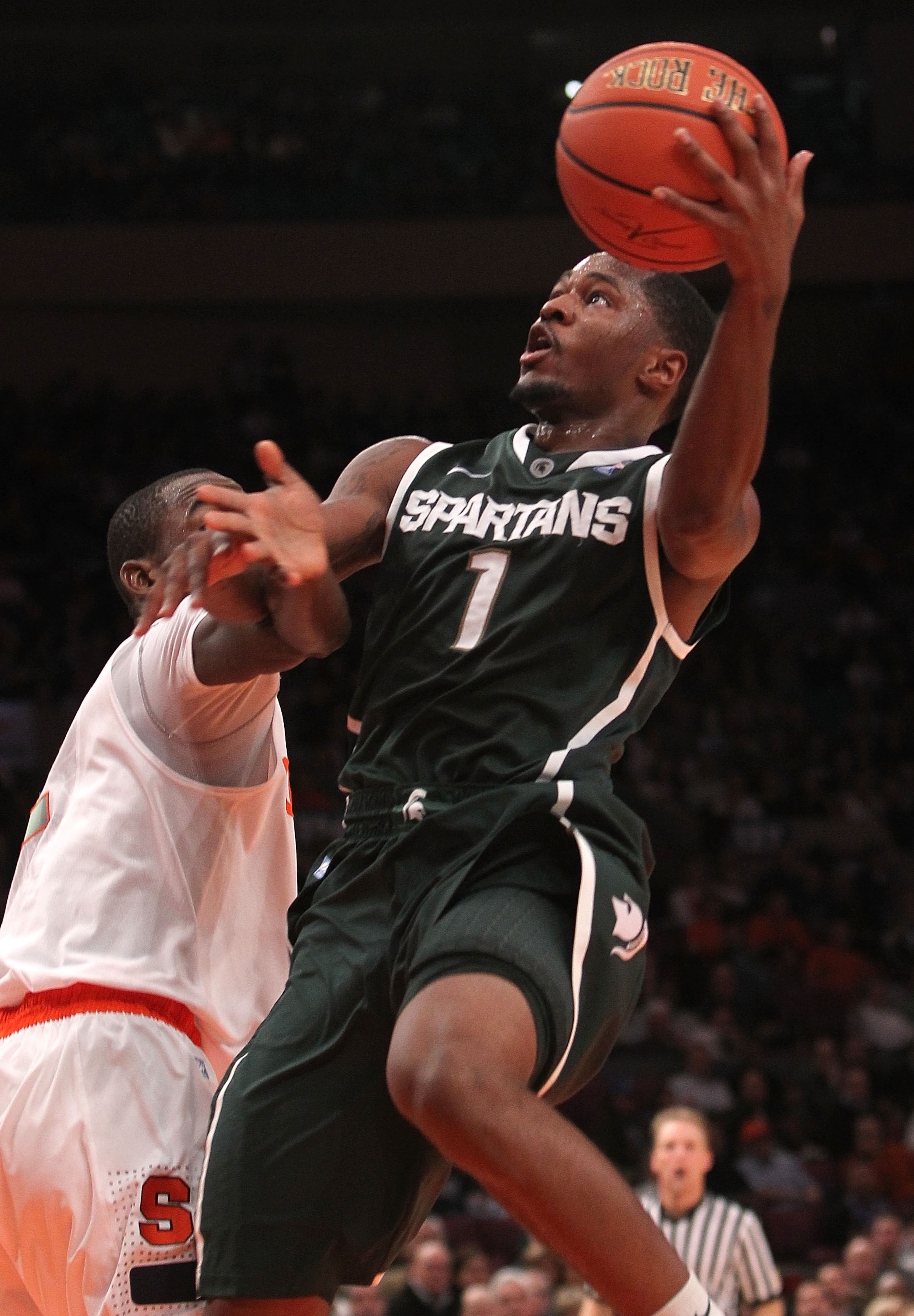 NEW YORK, NY - DECEMBER 07:  Kalin Lucas #1 of the Michigan Spartans lays the ball up  against Syracuse Orange during their game at the Jimmy V Classic at Madison Square Garden on December 7, 2010 in New York City.  (Photo by Nick Laham/Getty Images)