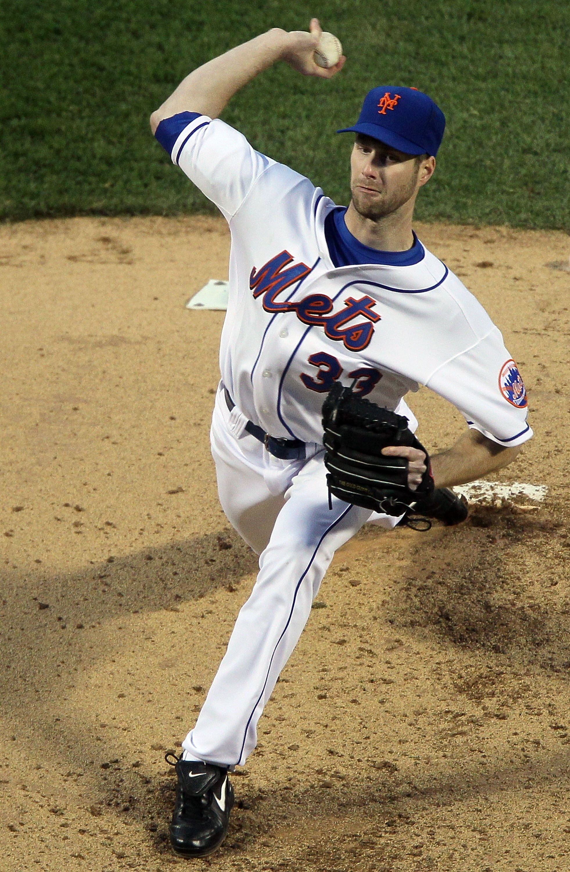 NEW YORK - MAY 10:  John Maine #33 of the New York Mets delivers a pitch against the Washington Nationals on May 10, 2010 at Citi Field in the Flushing neighborhood of the Queens borough of New York City.  (Photo by Jim McIsaac/Getty Images)