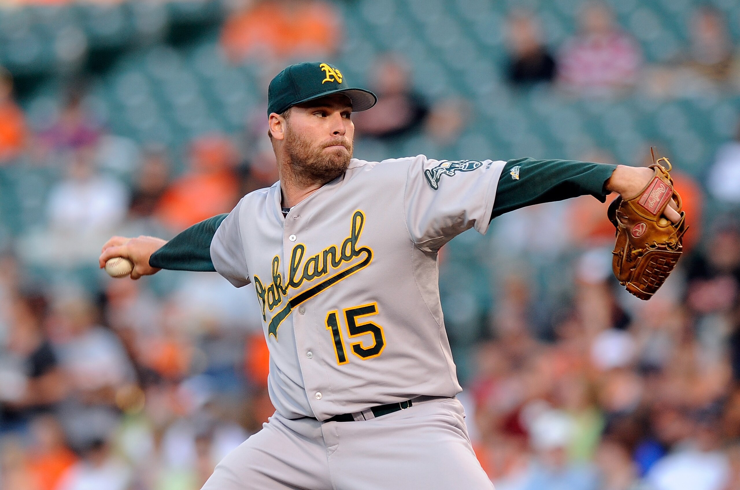 BALTIMORE - JUNE 30:  Ben Sheets #15 of the Oakland Athletics pitches against the Baltimore Orioles at Camden Yards on June 30, 2010 in Baltimore, Maryland.  (Photo by Greg Fiume/Getty Images)