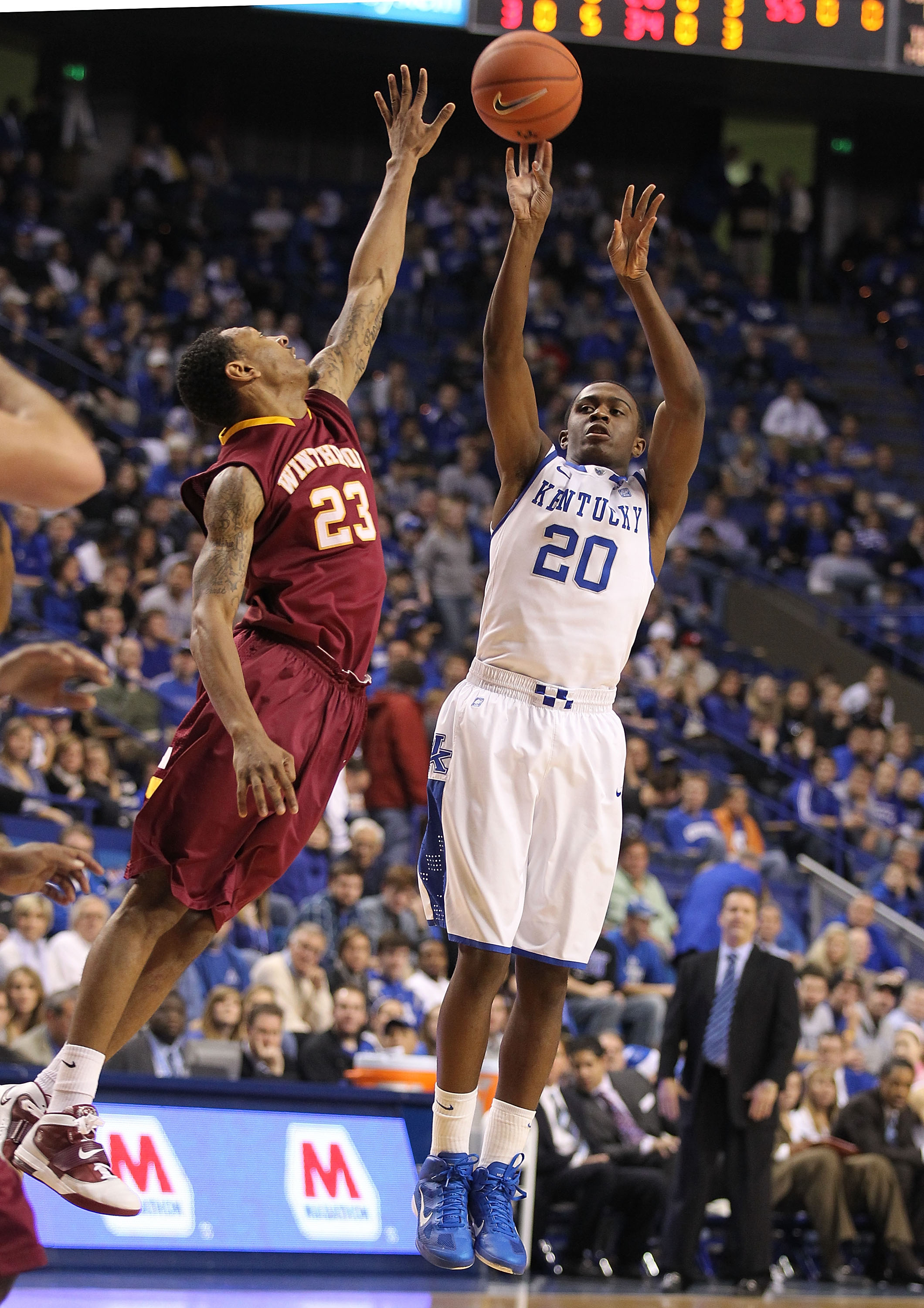 LEXINGTON, KY - DECEMBER 22:  Doron Lamb #20 of the Kentucky Wildcats shoots the ball while defended by Robbie Dreher #23 of the Winthrop Eagles during the game on December 22, 2010 in Lexington, Kentucky.  (Photo by Andy Lyons/Getty Images)