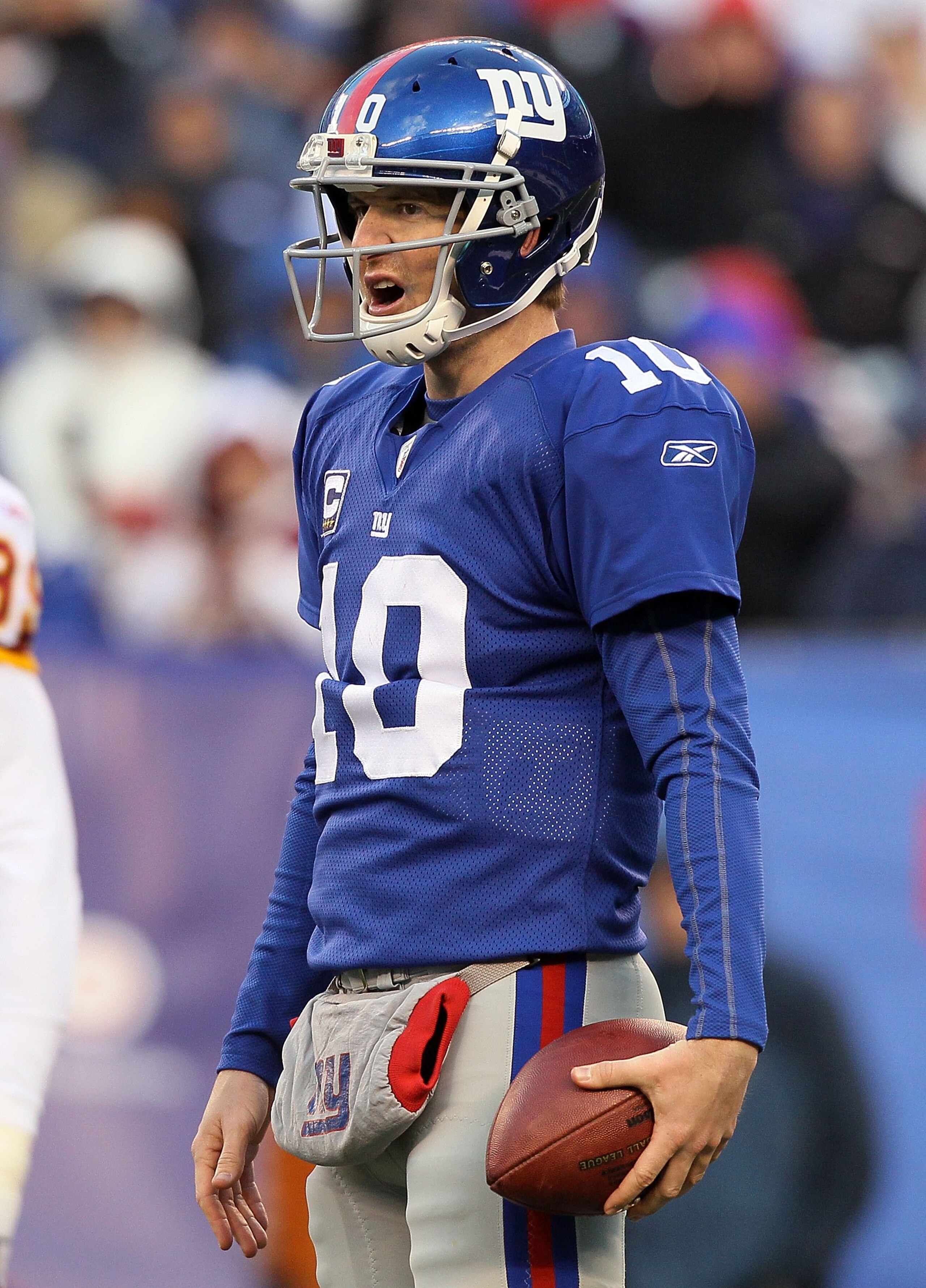 EAST RUTHERFORD, NJ - DECEMBER 05:  Eli Manning #10 of the New York Giants fires looks on against the Washington Redskins on December 5, 2010 at the New Meadowlands Stadium in East Rutherford, New Jersey. The Giants defeated the Redskins 31-7.  (Photo by