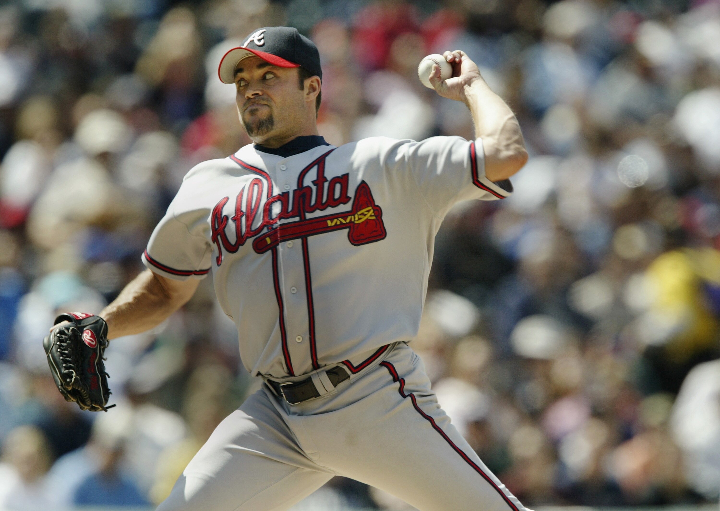 DENVER - MAY 1:  Starter Mike Hampton #32 of the Atlanta Braves delivers a pitch against the Colorado Rockies in the fifth inning at Coors Field on May 1, 2004 in Denver, Colorado.  The Rockies won 3-2; while Hampton got no decicion on five innings pitche