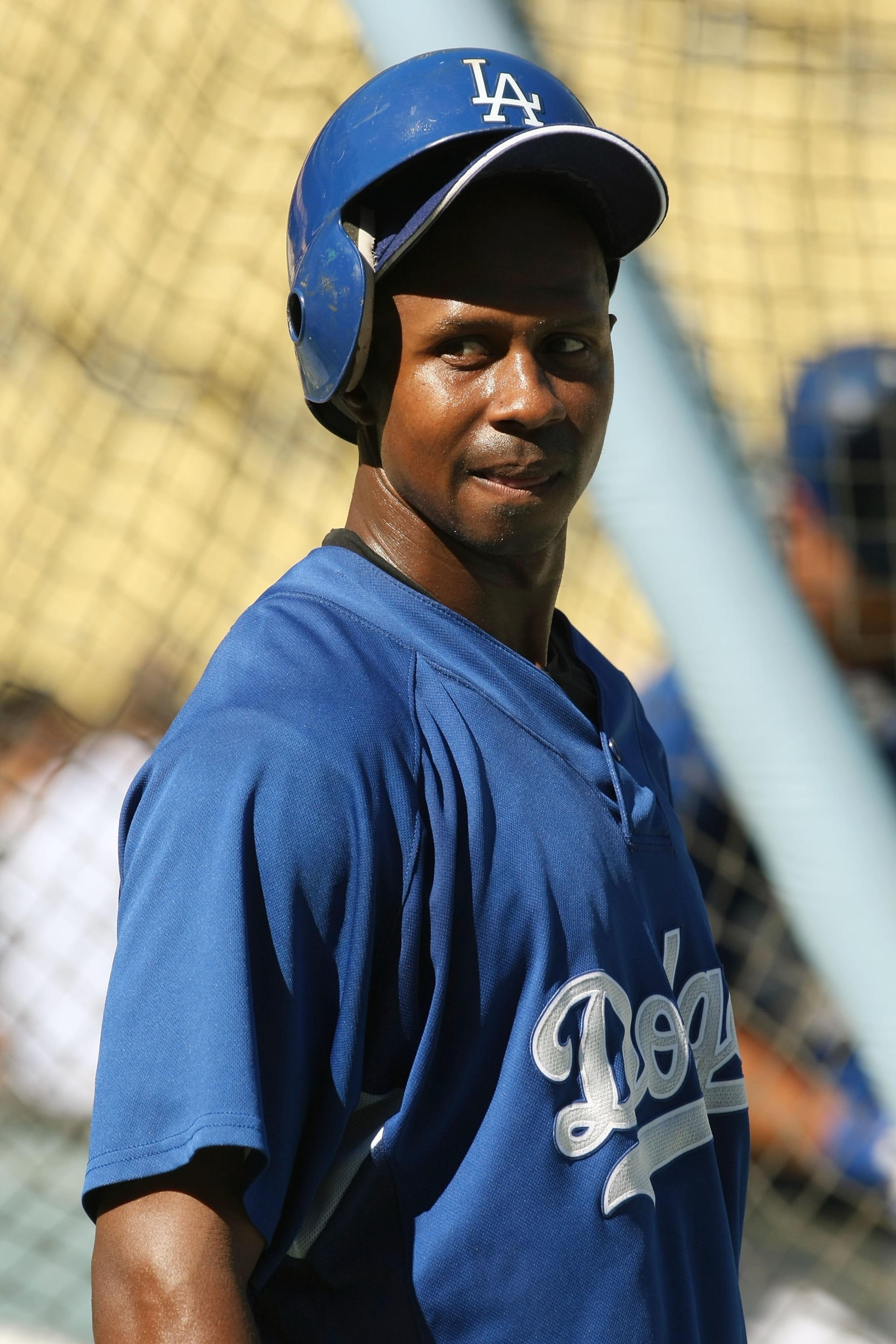 LOS ANGELES, CA - OCTOBER 16: Juan Pierre #9 of the Los Angeles Dodgers looks on during warm ups prior to the start of Game Two of the NLCS against the Philadelphia Phillies during the 2009 MLB Playoffs at Dodger Stadium on October 16, 2009 in Los Angel LOS ANGELES, CA - OCTOBER 16: Juan Pierre #9 of the Los Angeles Dodgers looks on during warm ups prior to the start of Game Two of the NLCS against the Philadelphia Phillies during the 2009 MLB Playoffs at Dodger Stadium on October 16, 2009 in Los Angel