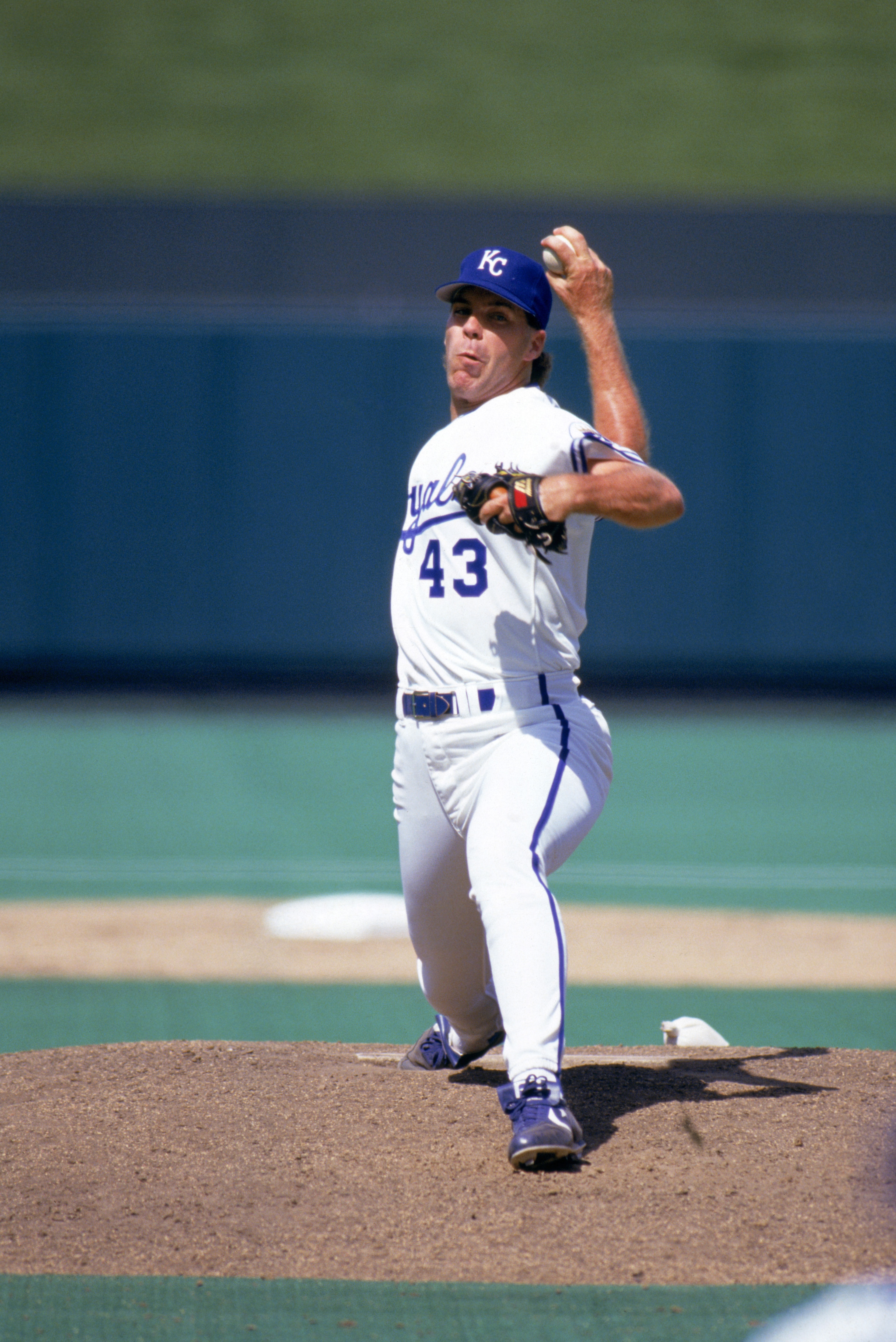 KANSAS CITY, MO - 1991:  Storm Davis #43 of the Kansas City Royals delivers a pitch during a game in July of 1991 at Royals Stadium in Kansas City, Missouri.  (Photo by Jonathan Daniel/Getty Images)