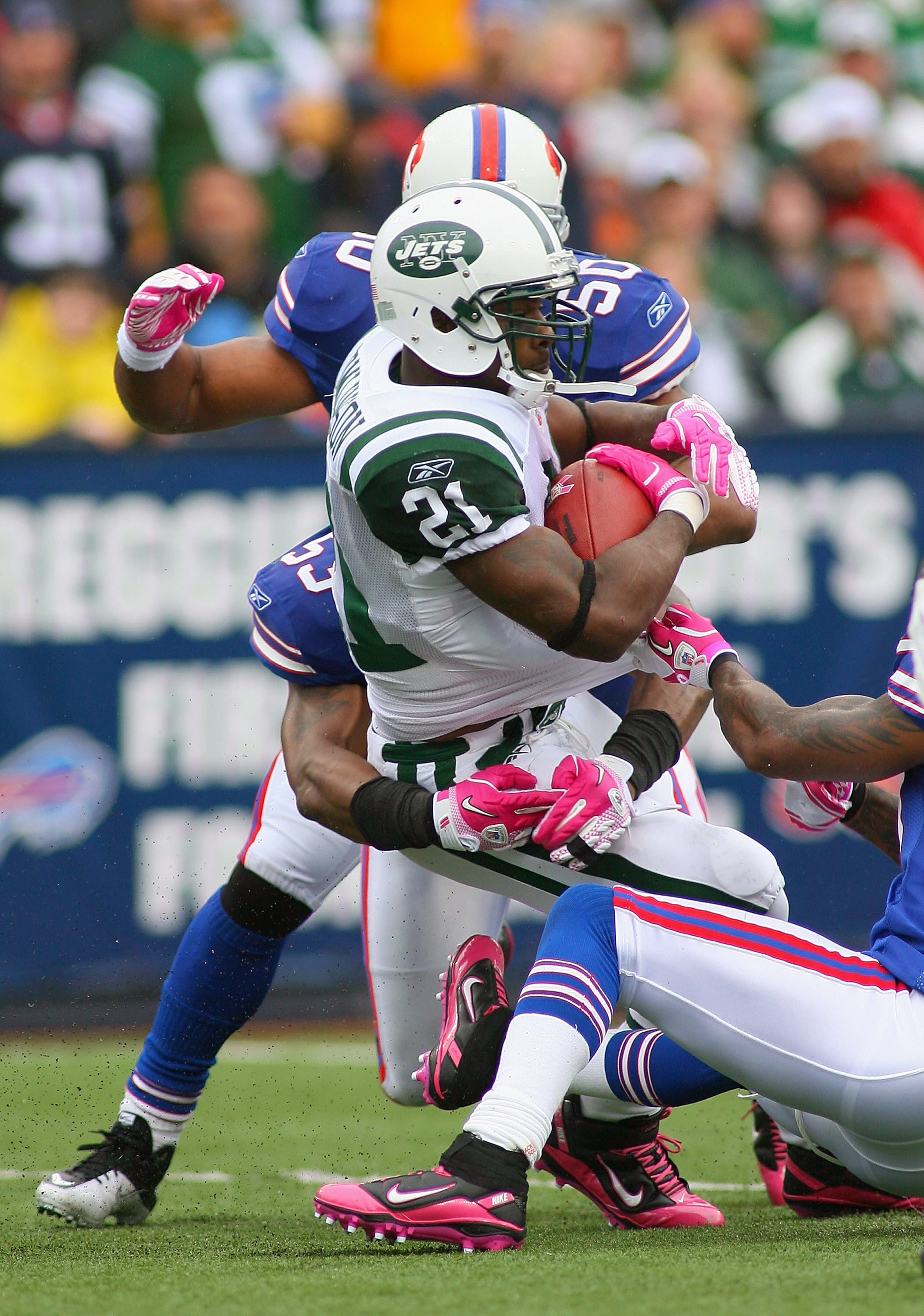 ORCHARD PARK, NY - OCTOBER 03:  LaDainian Tomlinson #21 of the New York Jets runs against the Buffalo Bills at Ralph Wilson Stadium on October 3, 2010 in Orchard Park, New York.  The Jets won 38-14.  (Photo by Rick Stewart/Getty Images)