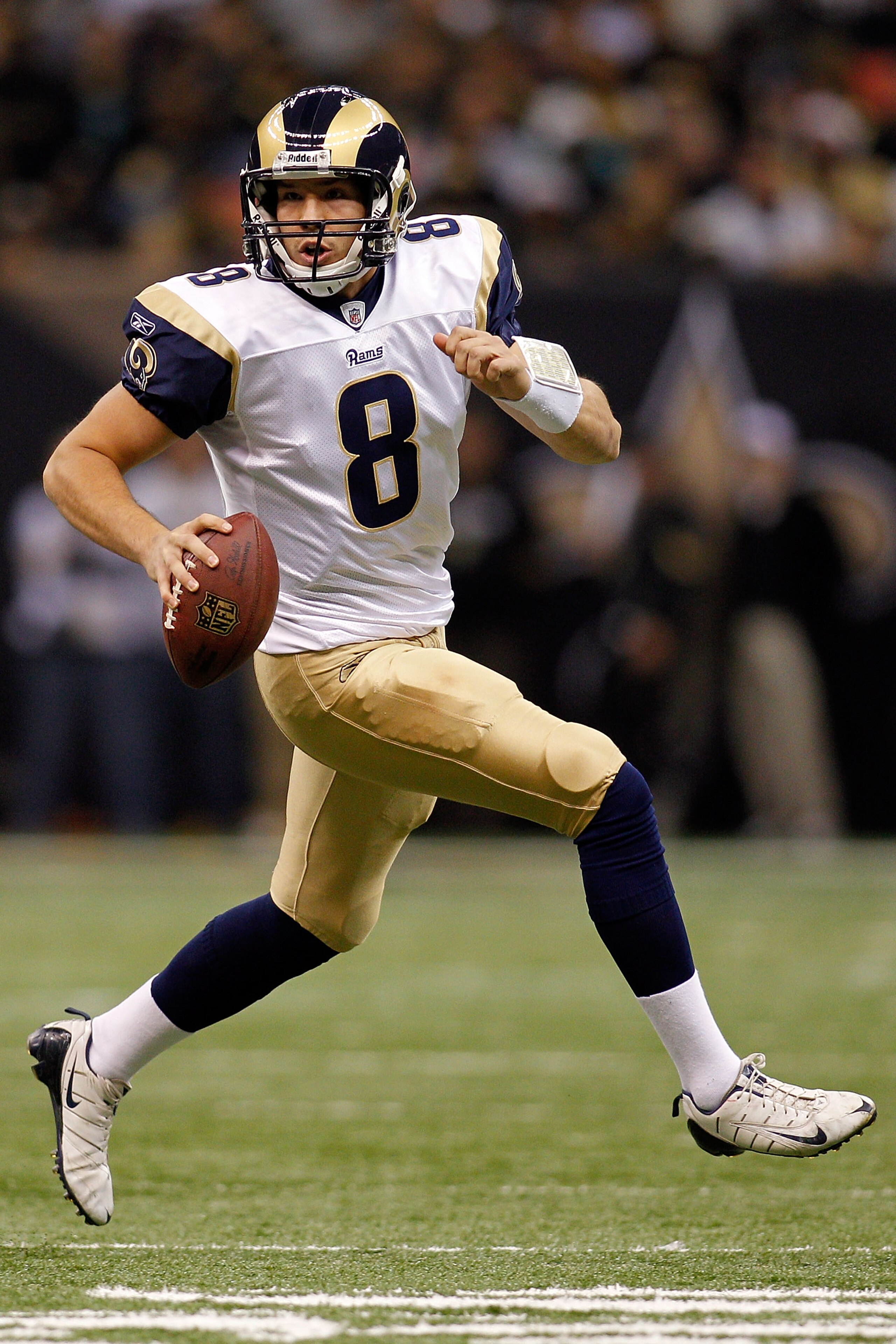 NEW ORLEANS, LA - DECEMBER 12:  Quarterback Sam Bradford #8 of the St. Louis Rams looks to throw a pass during the game against the New Orleans Saints at the Louisiana Superdome on December 12, 2010 in New Orleans, Louisiana. The Saints defeated the Rams