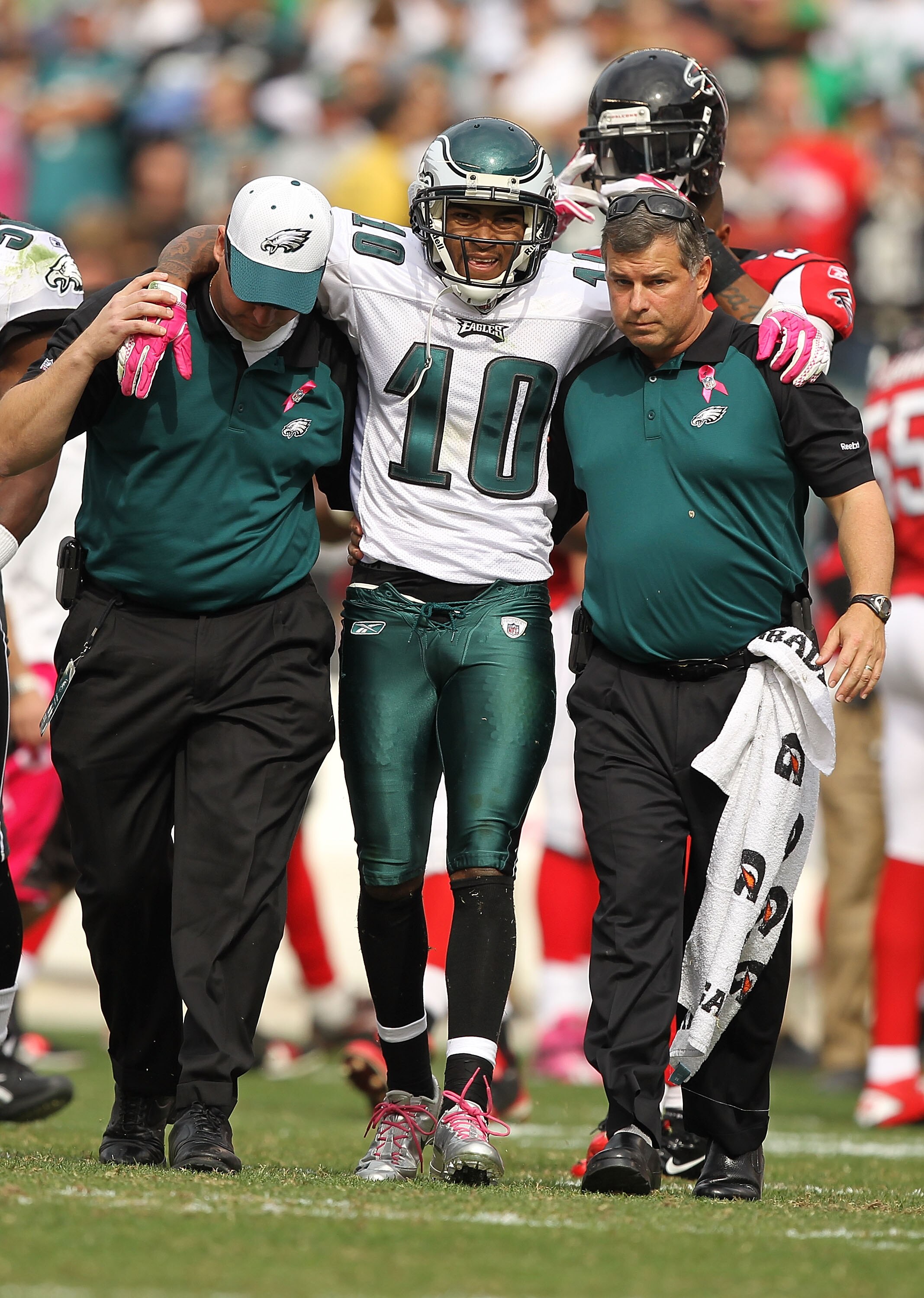 PHILADELPHIA - OCTOBER 17:  DeSean Jackson #10 of the Philadelphia Eagles is helped off the field after being  laid out by Dunta Robinson #23 of the Atlanta Falcons during their game at Lincoln Financial Field on October 17, 2010 in Philadelphia, Pennsylv