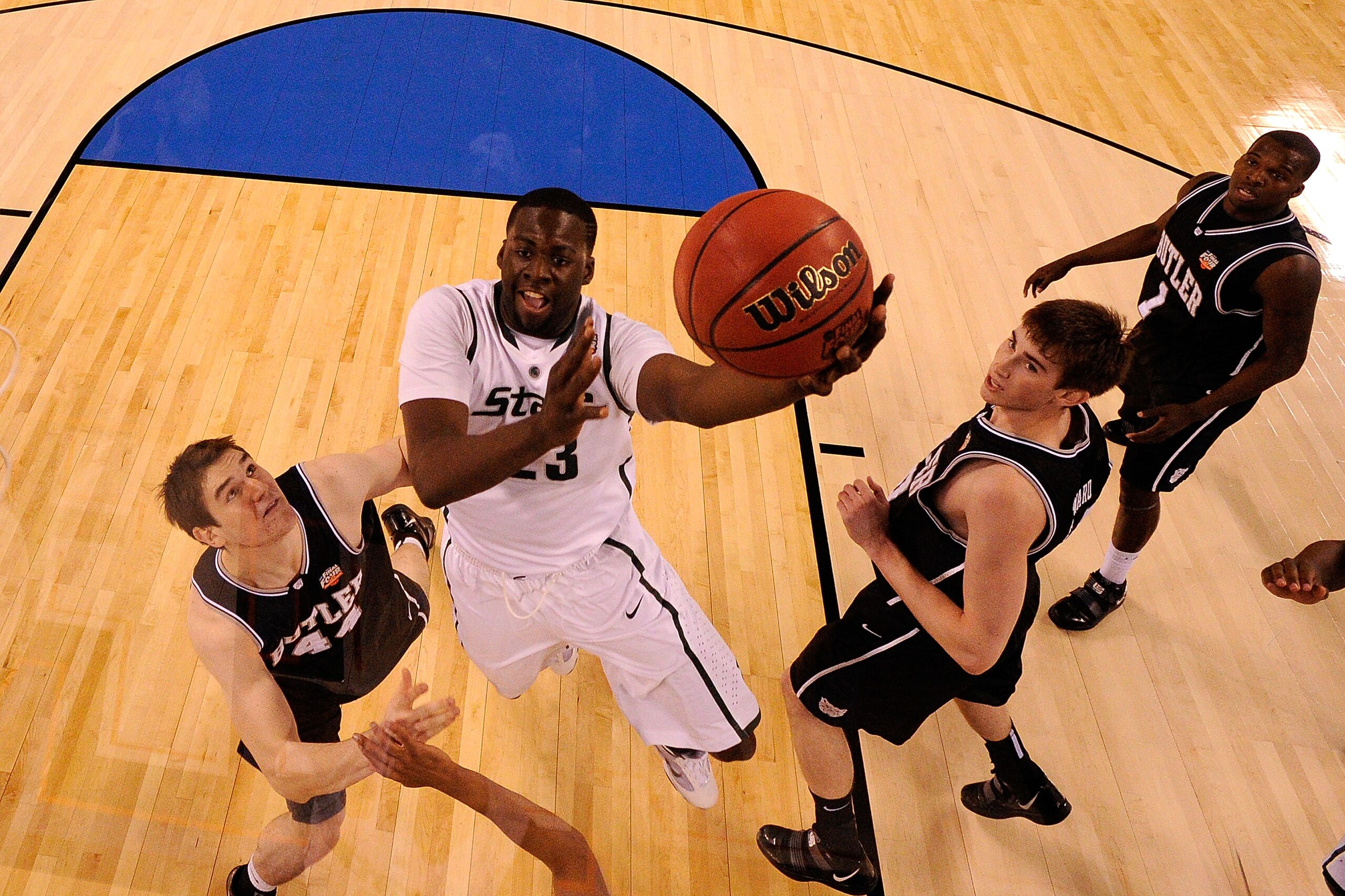 INDIANAPOLIS - APRIL 03:  Draymond Green #23 of the Michigan State Spartans attempts a shot against Andrew Smith #44 of the Butler Bulldogs during the National Semifinal game of the 2010 NCAA Division I Men's Basketball Championship on April 3, 2010 in In