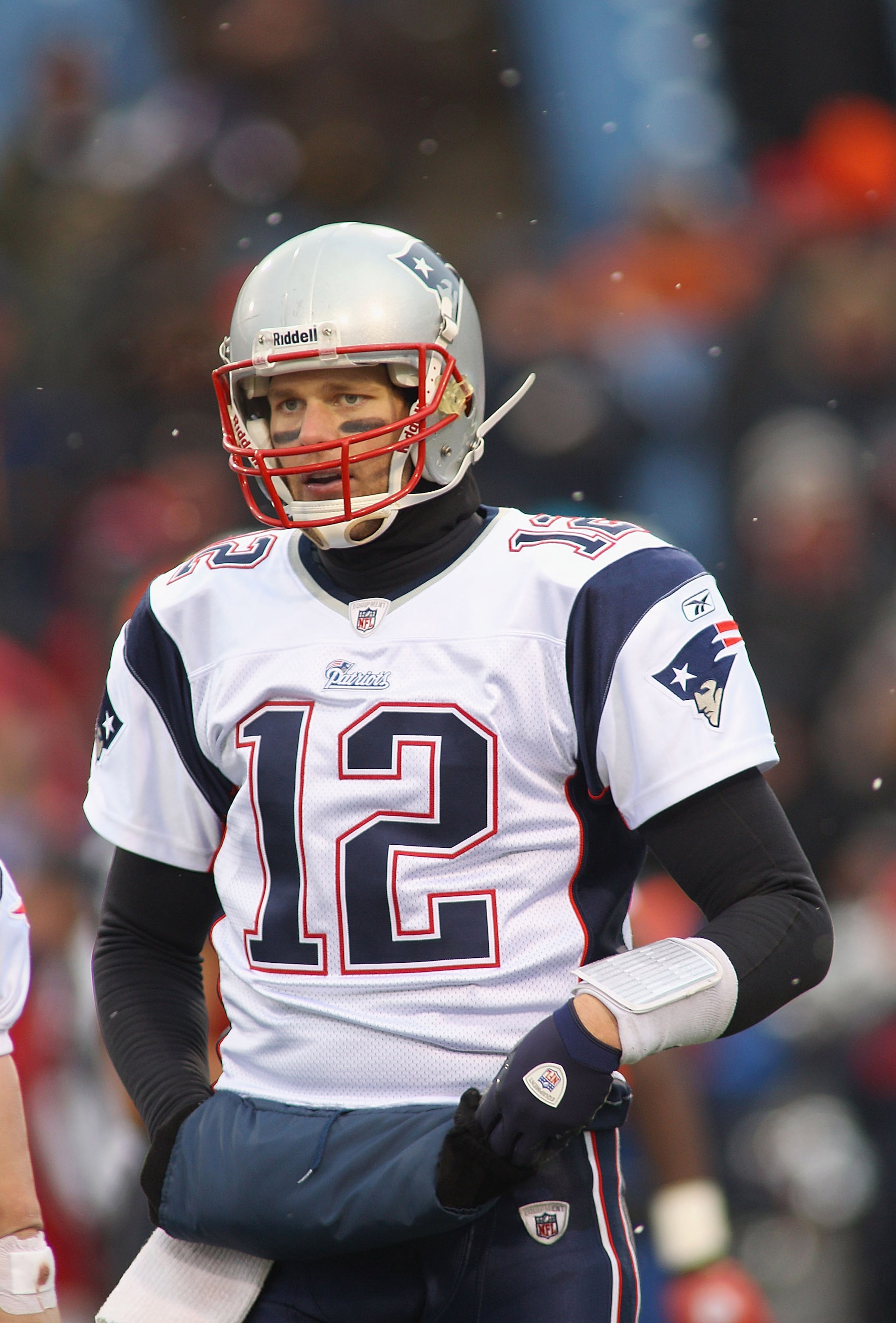 ORCHARD PARK, NY - DECEMBER 26:  Tom Brady #12 of the New England Patriots stands on the field  against the Buffalo Bills  at Ralph Wilson Stadium on December 26, 2010 in Orchard Park, New York.  New England won 34-3.  (Photo by Rick Stewart/Getty Images)