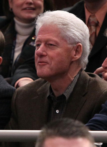 NEW YORK - MARCH 11:  Former President William Jefferson Clinton attends the game between the Notre Dame Fighting Irish and the Pittsburgh Panthers during the quarterfinal of the 2010 NCAA Big East Tournament at Madison Square Garden on March 11, 2010 in