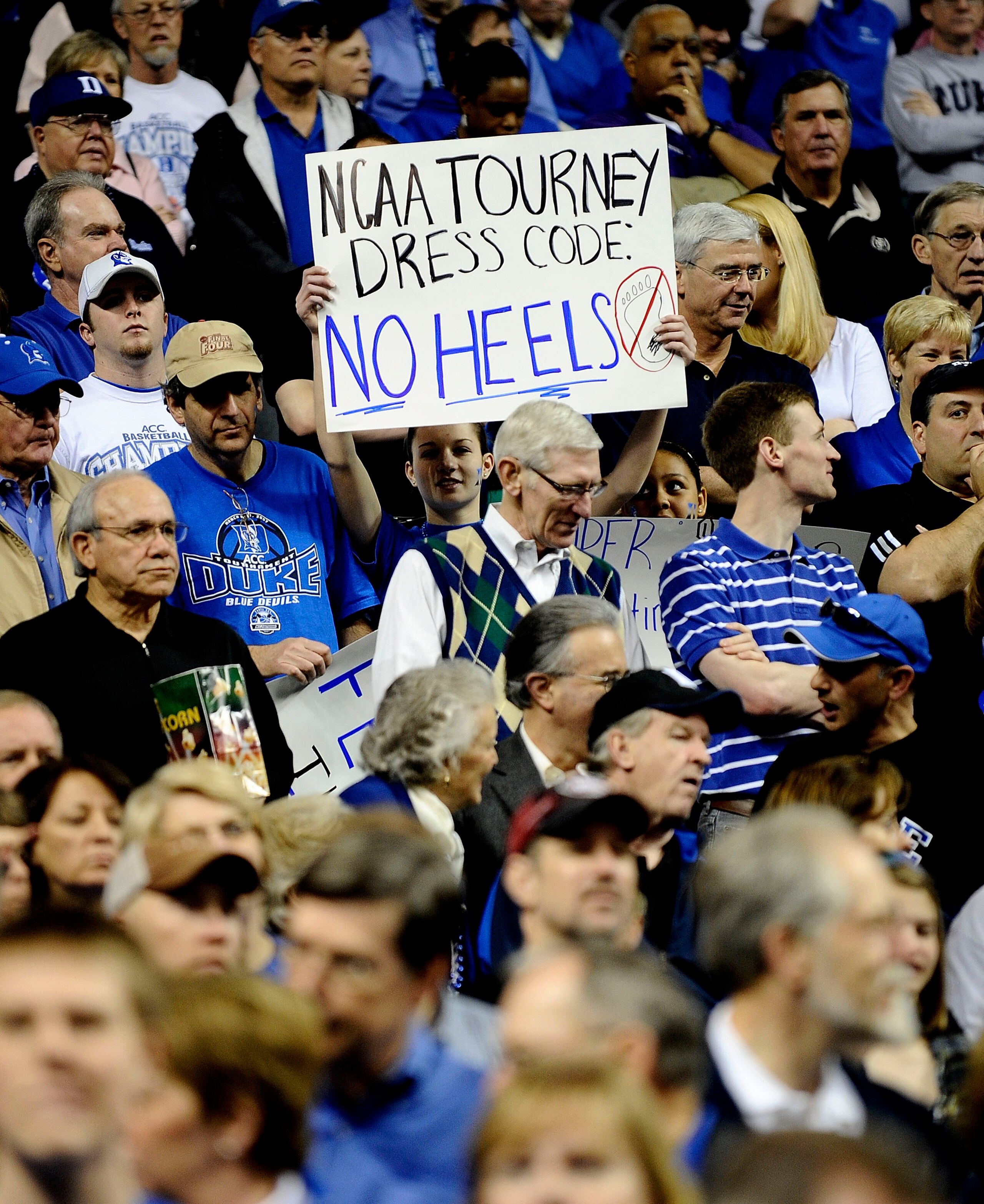 GREENSBORO, NC - MARCH 14:  Fans of the Duke Blue Devils watch the game against the Georgia Tech Yellow Jackets in the championship game of the 2010 ACC Men's Basketball Tournament at the Greensboro Coliseum on March 14, 2010 in Greensboro, North Carolina