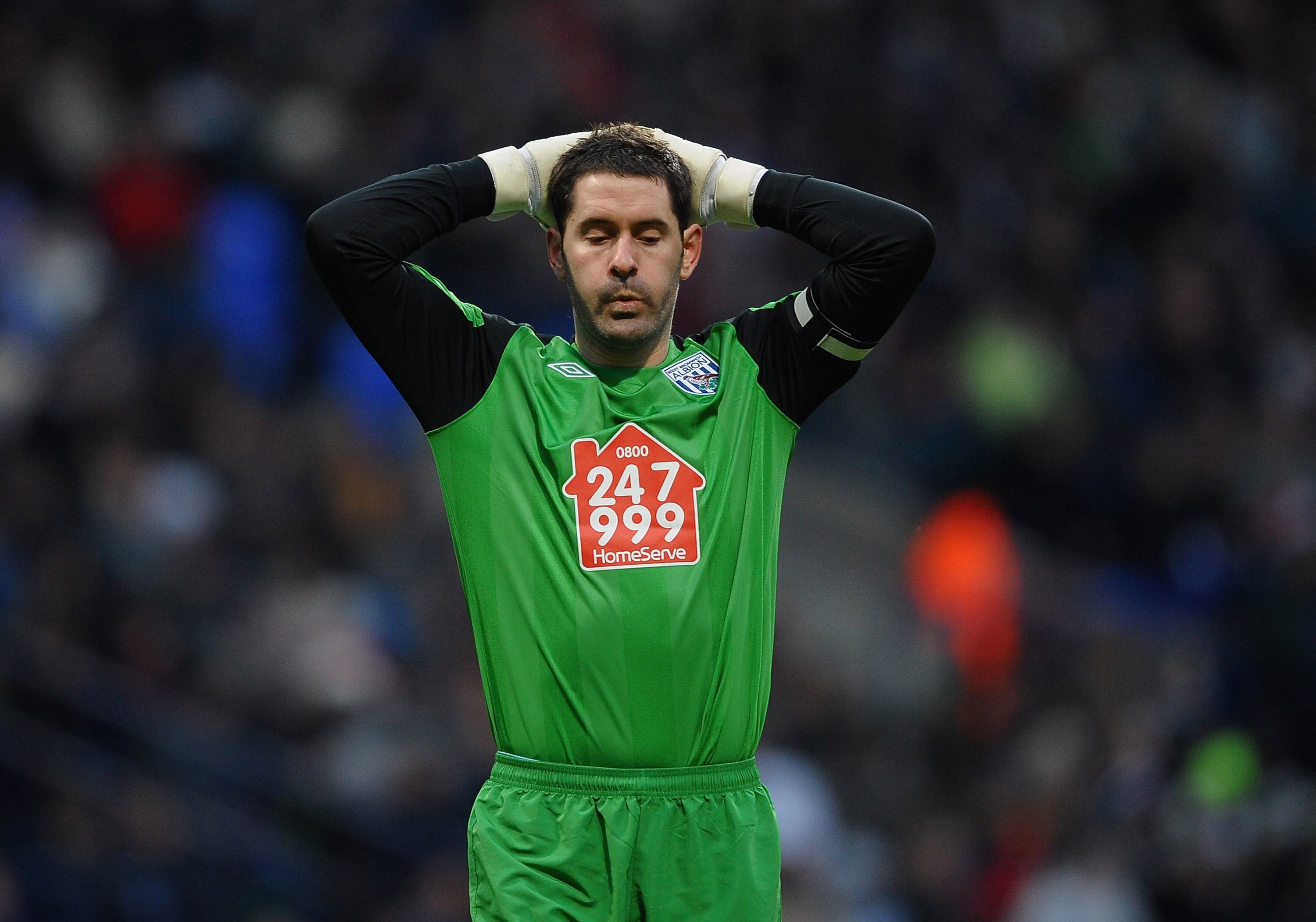 BOLTON, ENGLAND - DECEMBER 26: Scott Carson of West Bromwich Albion shows his disappointment during the Barclays Premier League match between Bolton Wanderers and West Bromwich Albion at Reebok Stadium on December 26, 2010 in Bolton, England.  (Photo by L