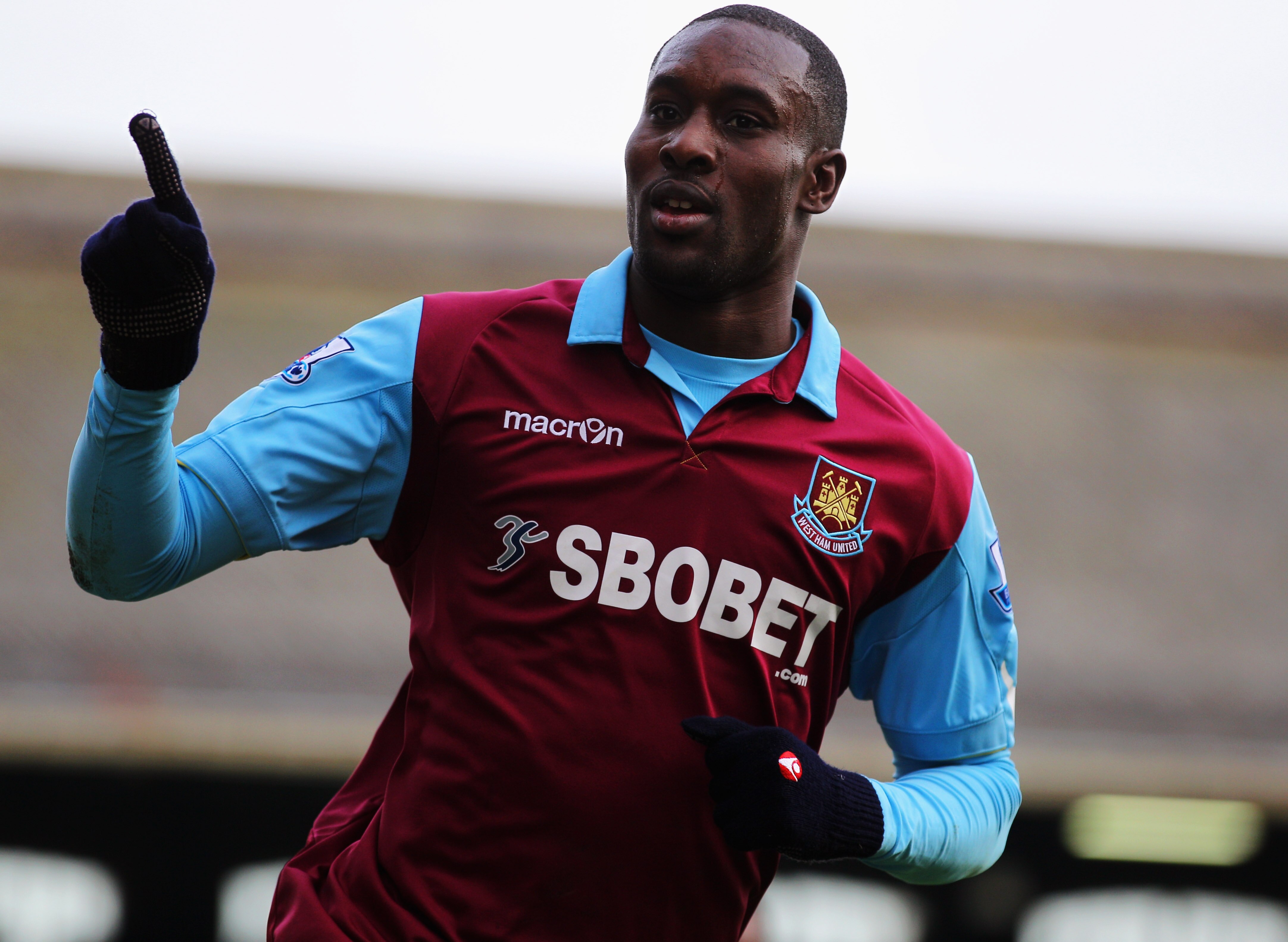 LONDON, ENGLAND - DECEMBER 26:  Carlton Cole of West Ham United celebrates as he scores their third goal during the Barclays Premier League match between Fulham and West Ham United at Craven Cottage on December 26, 2010 in London, England.  (Photo by Cliv
