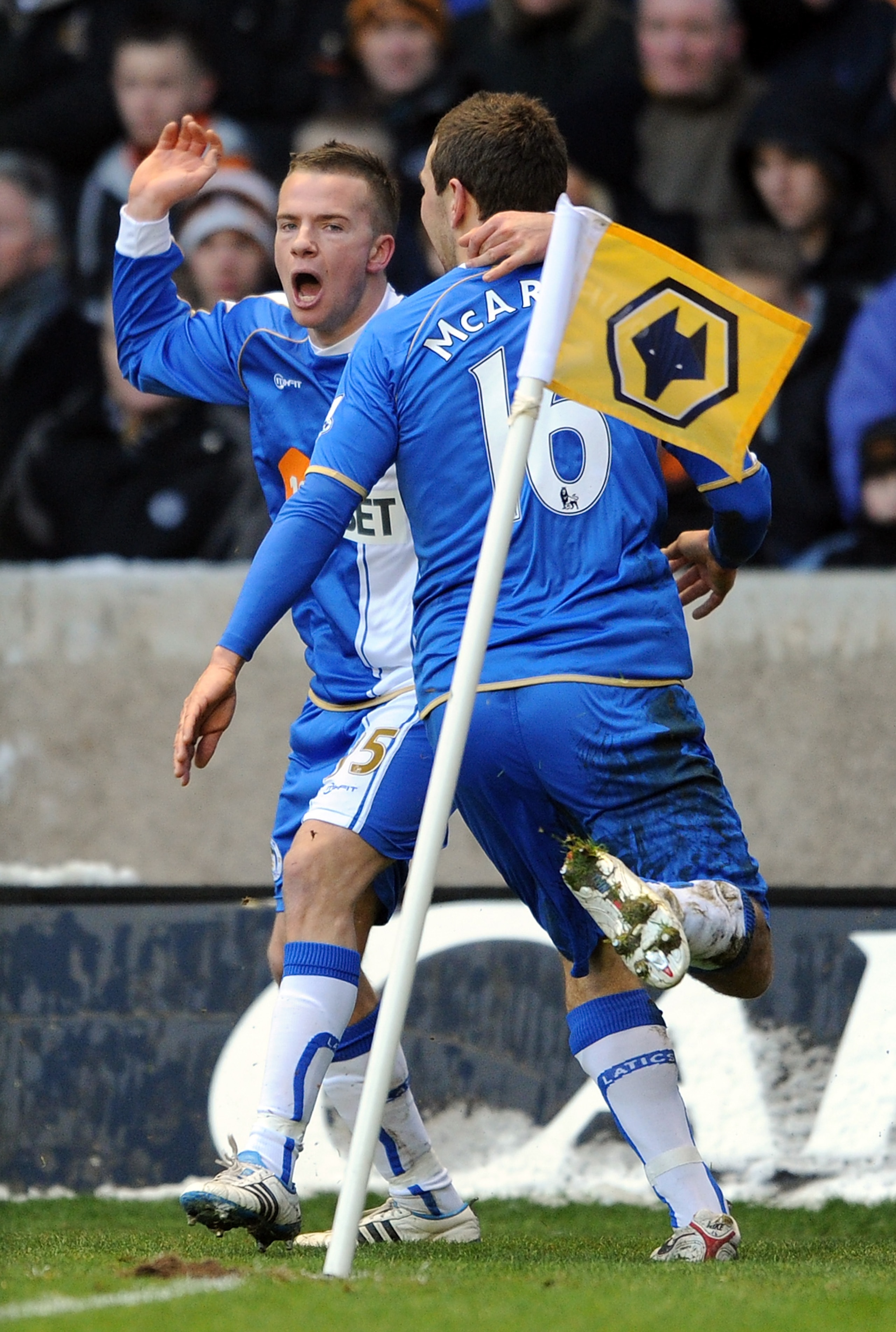 WOLVERHAMPTON, ENGLAND - DECEMBER 26:  Tom Cleverley (L) of Wigan Athletic celebrates scoring his side's second goal with team-mate James McArthur during the Barclays Premier League match between Wolverhampton Wanderers and Wigan Athletic at Molineux on D