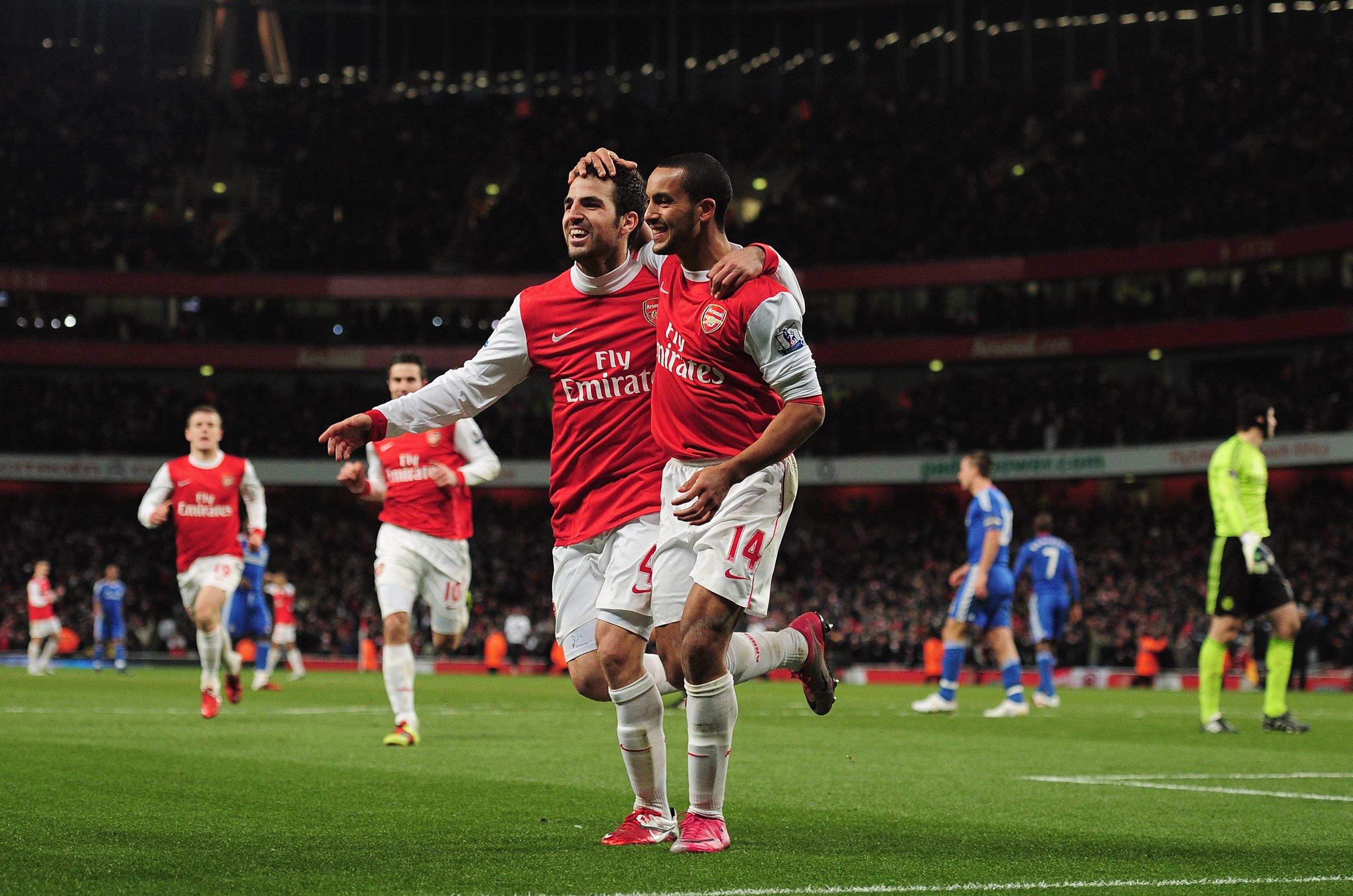 LONDON, ENGLAND - DECEMBER 27:  Cesc Fabregas of Arsenal celebrates Arsenal's second goal with Theo Walcott (R) during the Barclays Premier League match between Arsenal and Chelsea at the Emirates Stadium on December 27, 2010 in London, England.  (Photo b