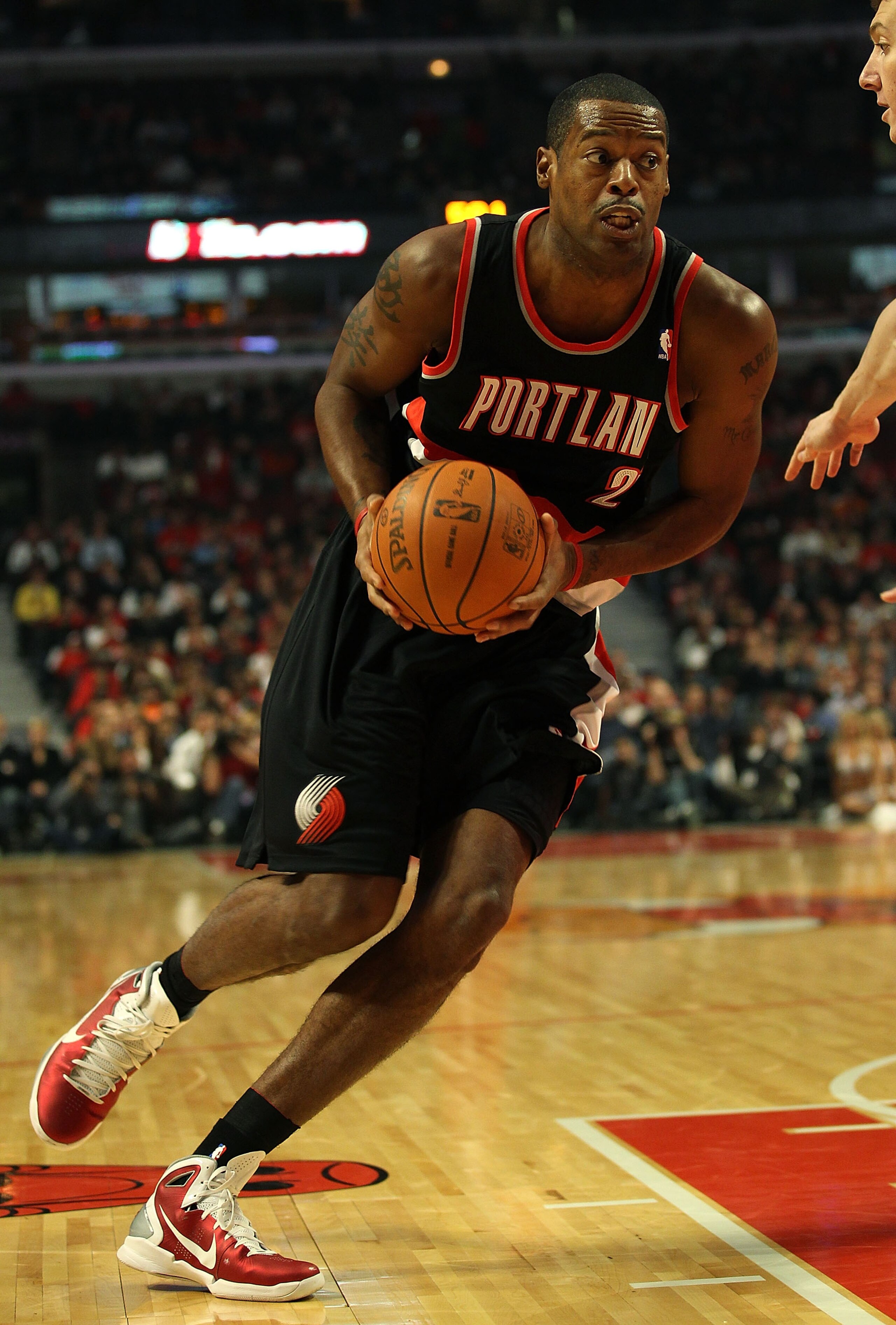 CHICAGO - NOVEMBER 01: Marcus Camby #23 of the Portland Trail Blazers drives to the lane against the Chicago Bulls at the United Center on November 1, 2010 in Chicago, Illinois. The Bulls defeated the Trail Blazers 110-98. NOTE TO USER: User expressly ack CHICAGO - NOVEMBER 01: Marcus Camby #23 of the Portland Trail Blazers drives to the lane against the Chicago Bulls at the United Center on November 1, 2010 in Chicago, Illinois. The Bulls defeated the Trail Blazers 110-98. NOTE TO USER: User expressly ack