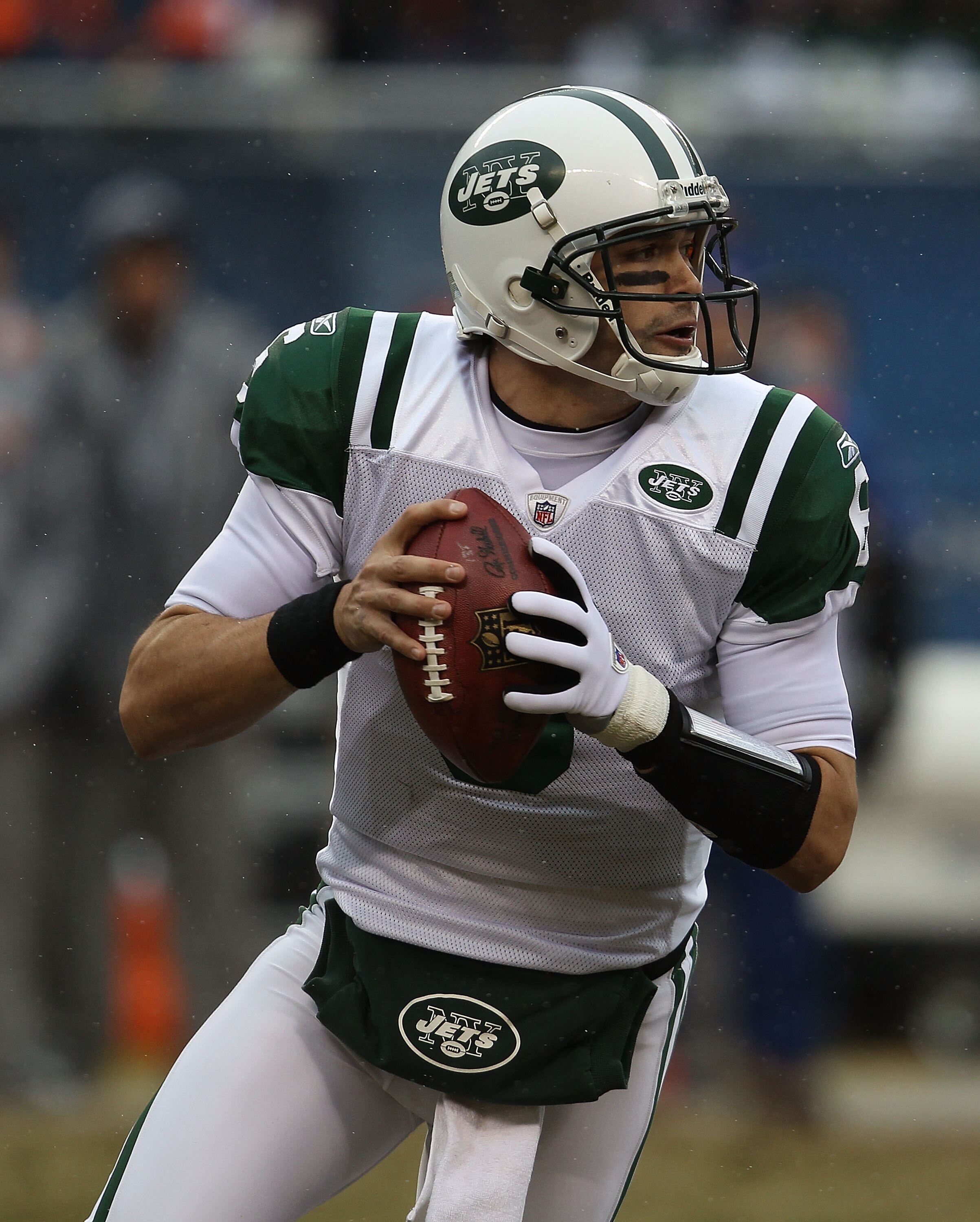 CHICAGO, IL - DECEMBER 26: Mark Sanchez #6 of the New York Jets rolls out to look for a receiver against the Chicago Bears rush at Soldier Field on December 26, 2010 in Chicago, Illinois. The Bears defeated the Jets 38-34. (Photo by Jonathan Daniel/Getty