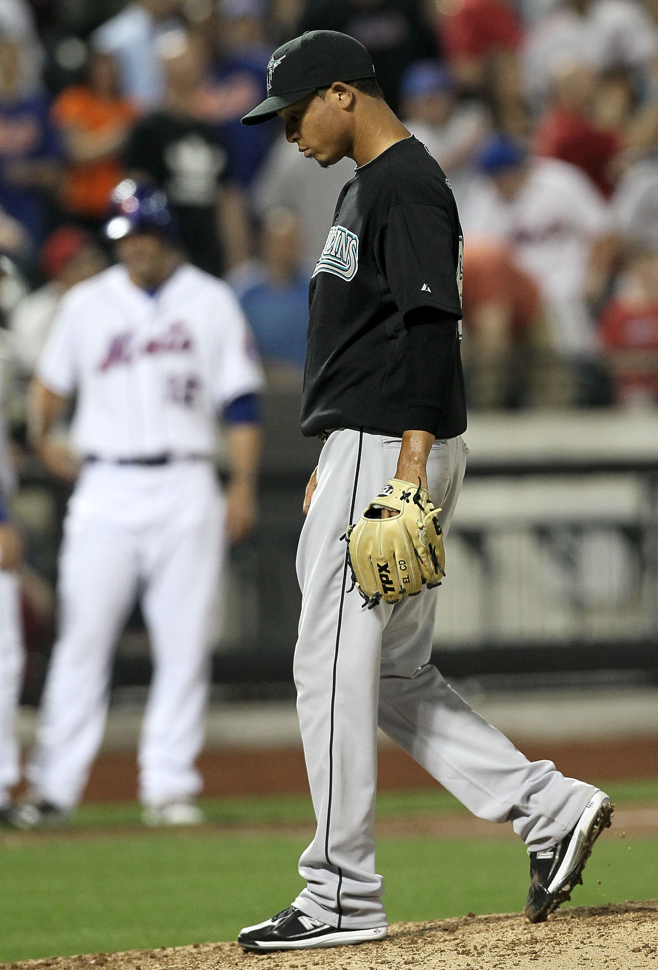 NEW YORK - APRIL 07:  Leo Nunez #46 of the Florida Marlins reacts after his eigth inning game tying bases loaded balk against the New York Mets on April 7, 2010 at Citi Field in the Flushing neighborhood of the Queens borough of New York City.  (Photo by