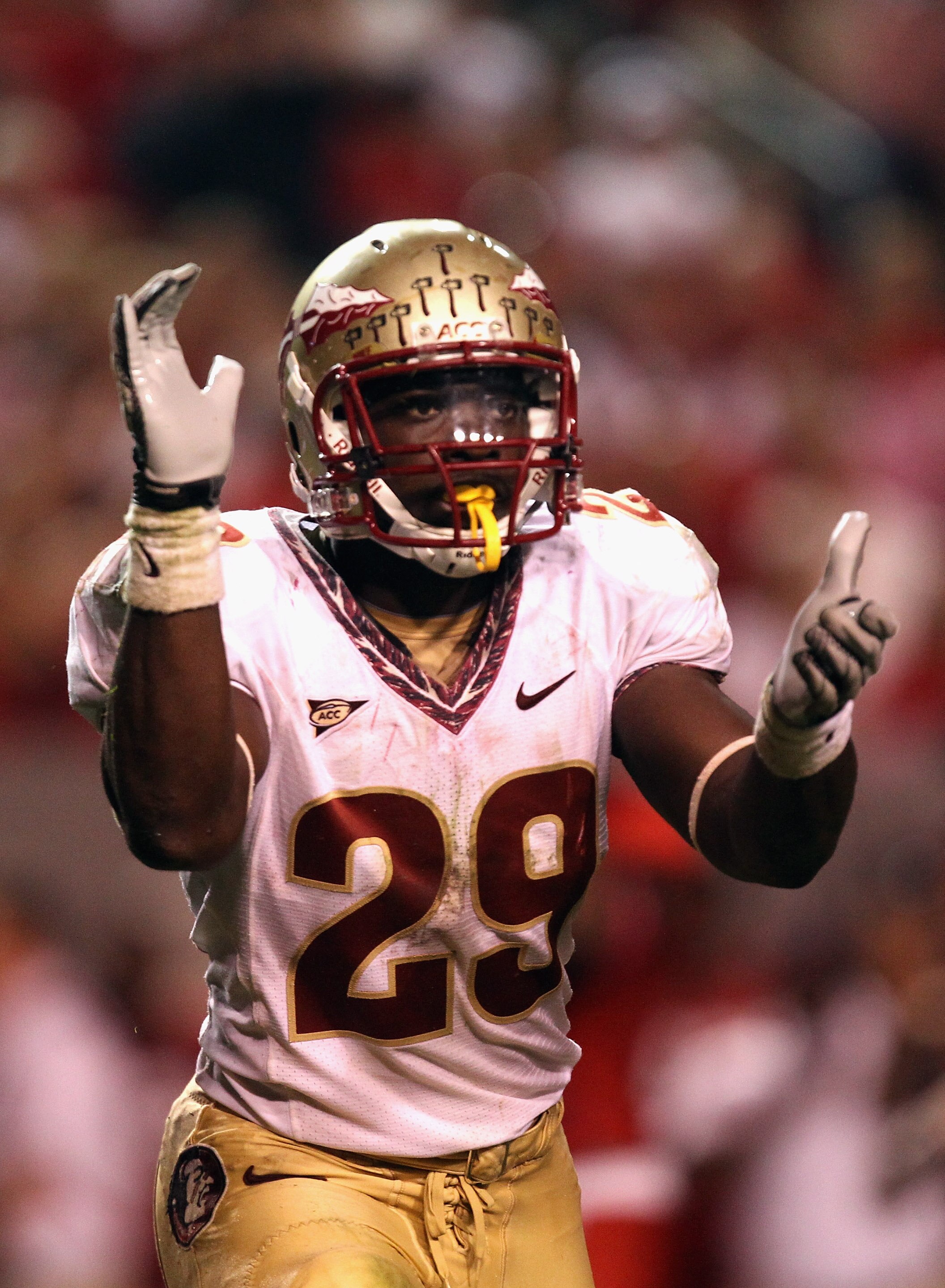 RALEIGH, NC - OCTOBER 28:  Kendall Smith #29 of the Florida State Seminoles celebrates after a fumble recovery against the North Carolina State Wolfpack during their game at Carter-Finley Stadium on October 28, 2010 in Raleigh, North Carolina.  (Photo by