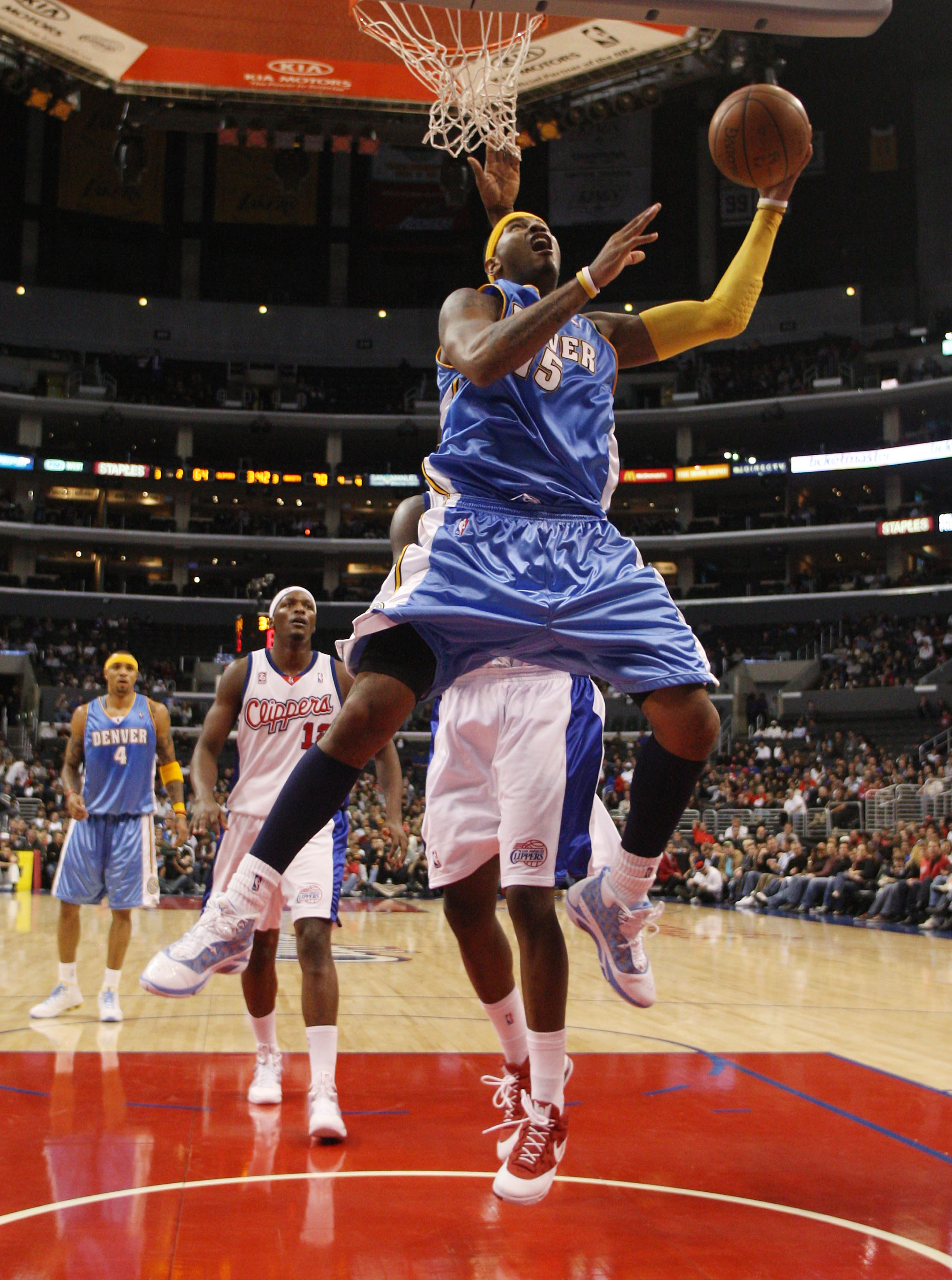 LOS ANGELES, CA - NOVEMBER 26:  Carmelo Anthony #15 of the Denver Nuggets drives to the basket for a layup against the Los Angeles Clippers during the second half at Staples Center on November 26, 2008 in Los Angeles, California. The Nuggets defeated the