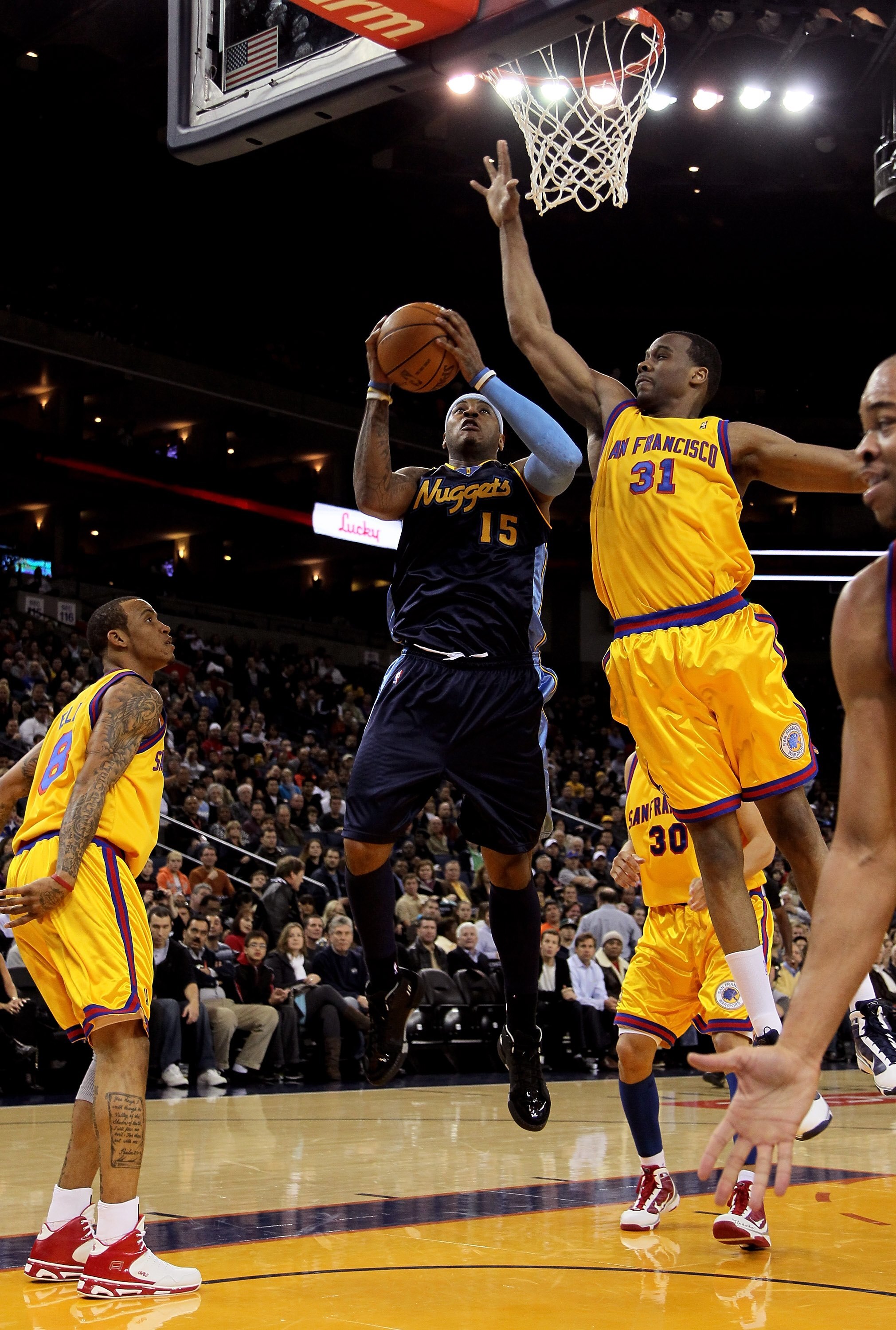 OAKLAND, CA - JANUARY 20:  Carmelo Anthony #15 of the Denver Nuggets in action during their game against the Golden State Warriors at Oracle Arena on January 20, 2010 in Oakland, California.  NOTE TO USER: User expressly acknowledges and agrees that, by d