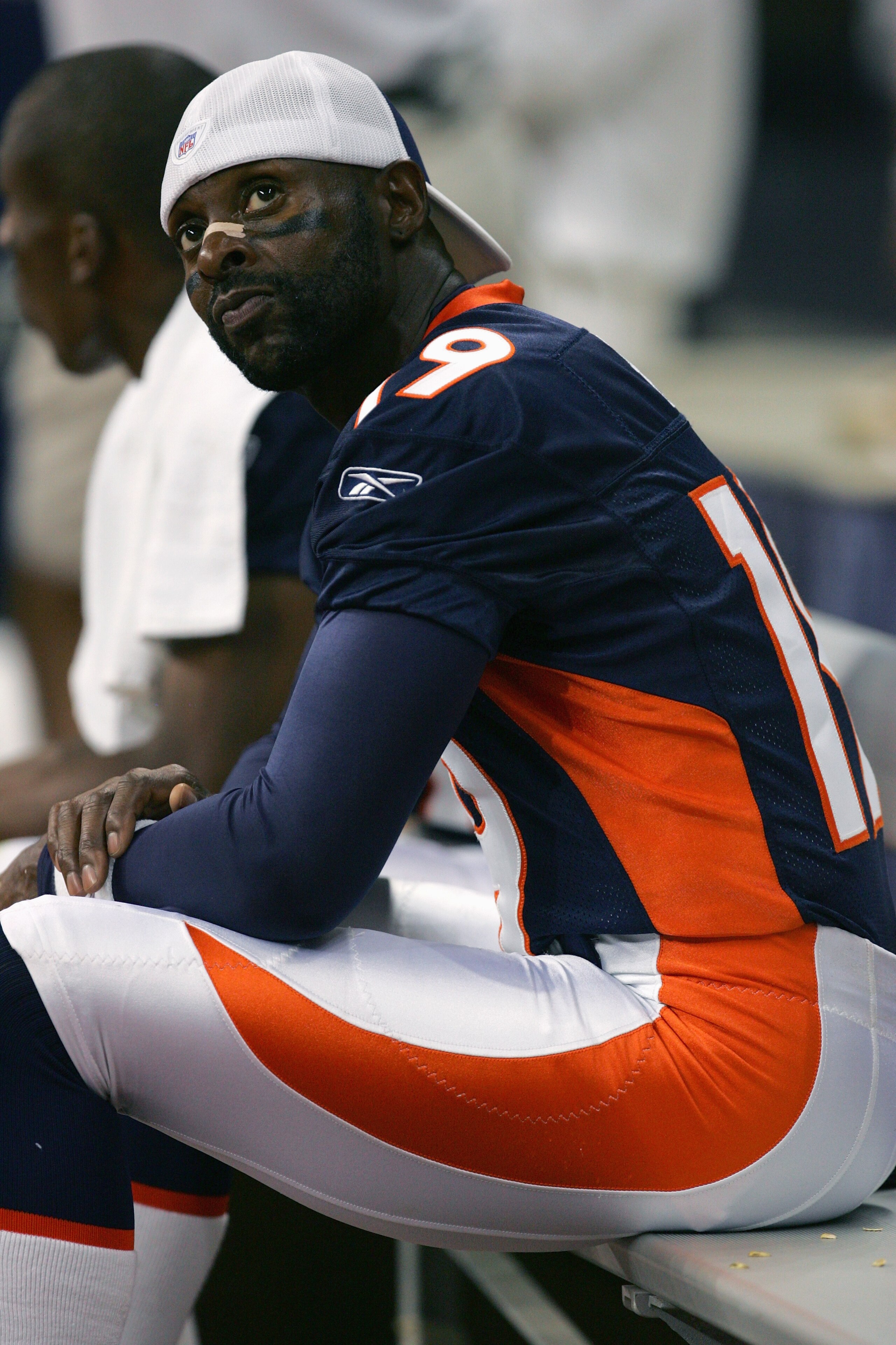 HOUSTON - AUGUST 13:  Wide receiver Jerry Rice #19 of the Denver Broncos sits on the bench during the preseason game against the Houston Texans on August 13, 2005 at Reliant Stadium in Houston, Texas.  The Broncos defeated the Texans 20-14.  (Photo by Ron