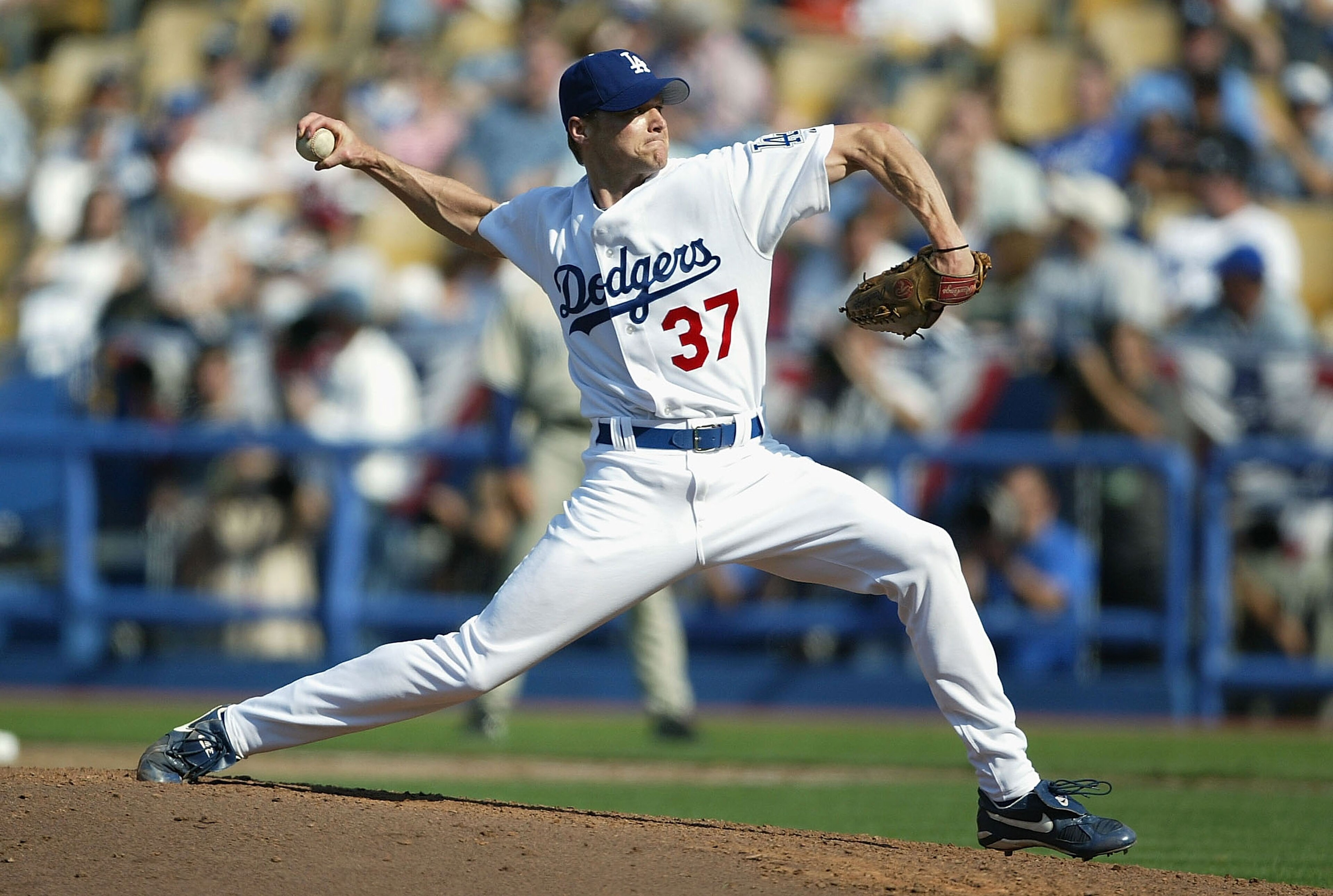 LOS ANGELES - APRIL 5:  Darren Dreifort #37 of the Los Angeles Dodgers pitches against the San Diego Padres on April 5, 2004 at Dodger Stadium in Los Angeles, California. The Padres defeated the Dodgers 8-2 in the season opener for both teams.  (Photo by