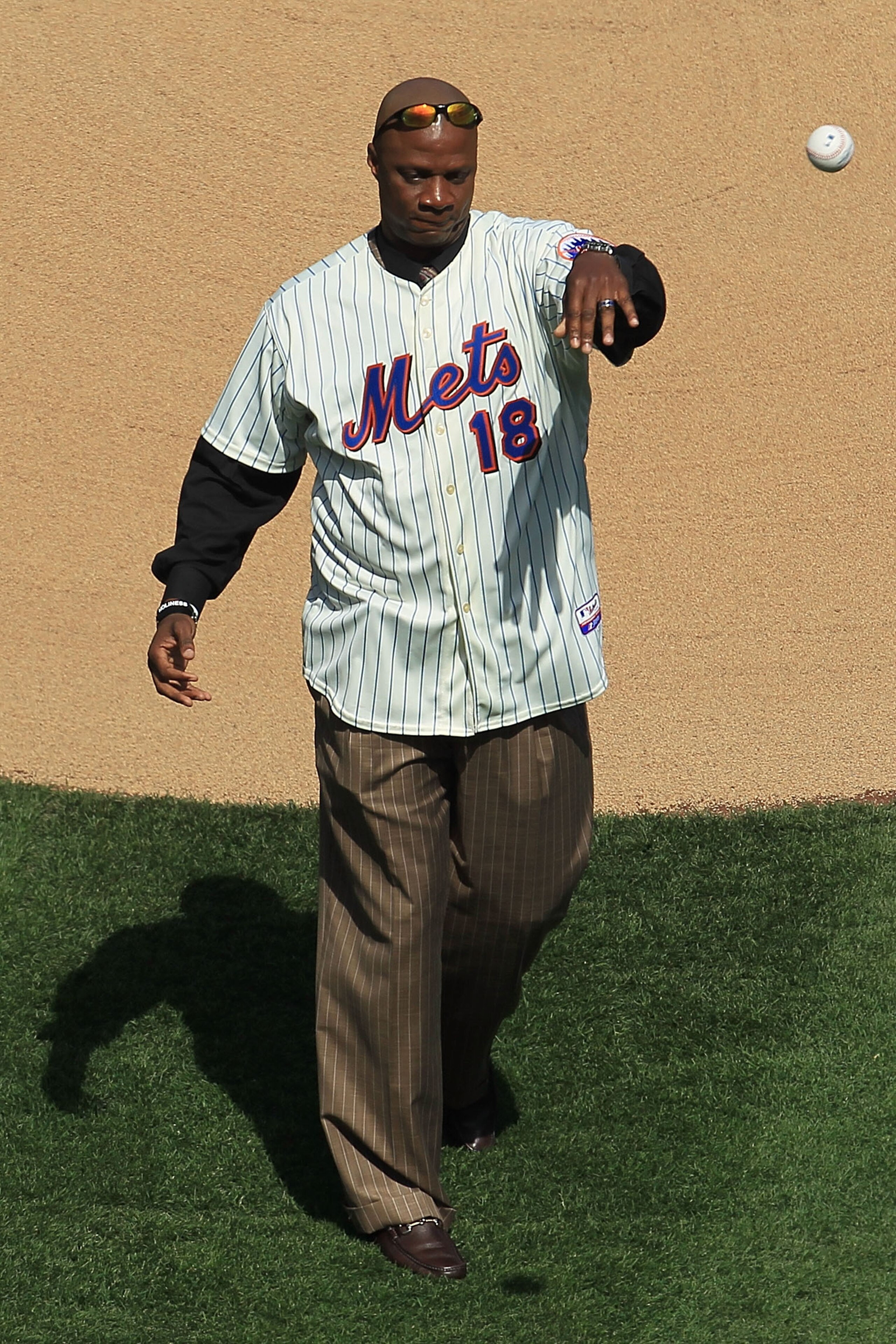 NEW YORK - APRIL 05: Former New York Mets player, Darryl Strawberry throws out the ceremonial first pitch prior to the game between the New York Mets and the Florida Marlins during their Opening Day game at Citi Field on April 5, 2010 in the Flushing neig NEW YORK - APRIL 05: Former New York Mets player, Darryl Strawberry throws out the ceremonial first pitch prior to the game between the New York Mets and the Florida Marlins during their Opening Day game at Citi Field on April 5, 2010 in the Flushing neig