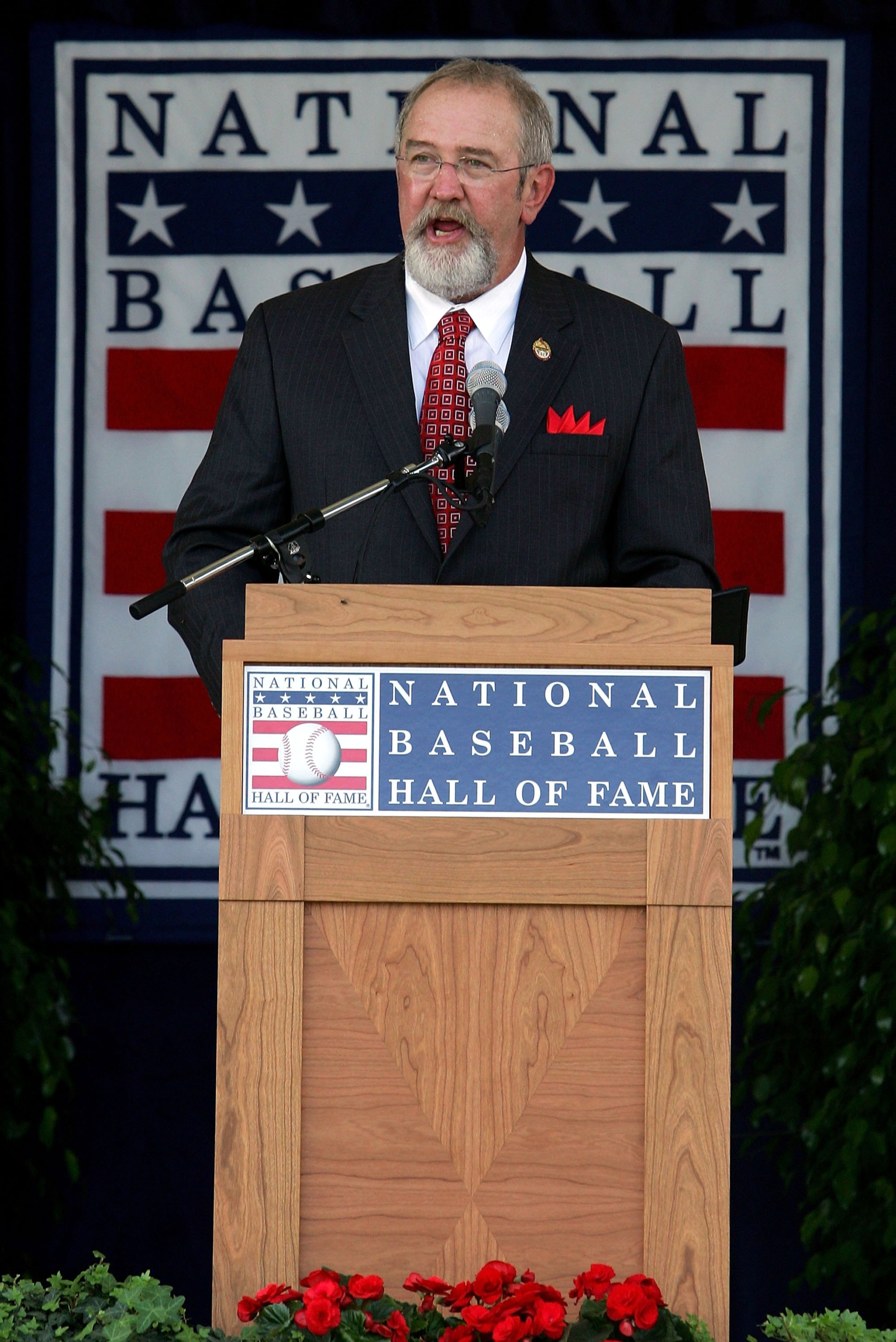 COOPERSTOWN, NY - JULY 30:  2006 inductee Bruce Sutter gives his acceptance speech at Clark Sports Center during the Baseball Hall of Fame induction ceremony on July 30, 2006 in Cooperstown, New York.  (Photo by Jim McIsaac/Getty Images)