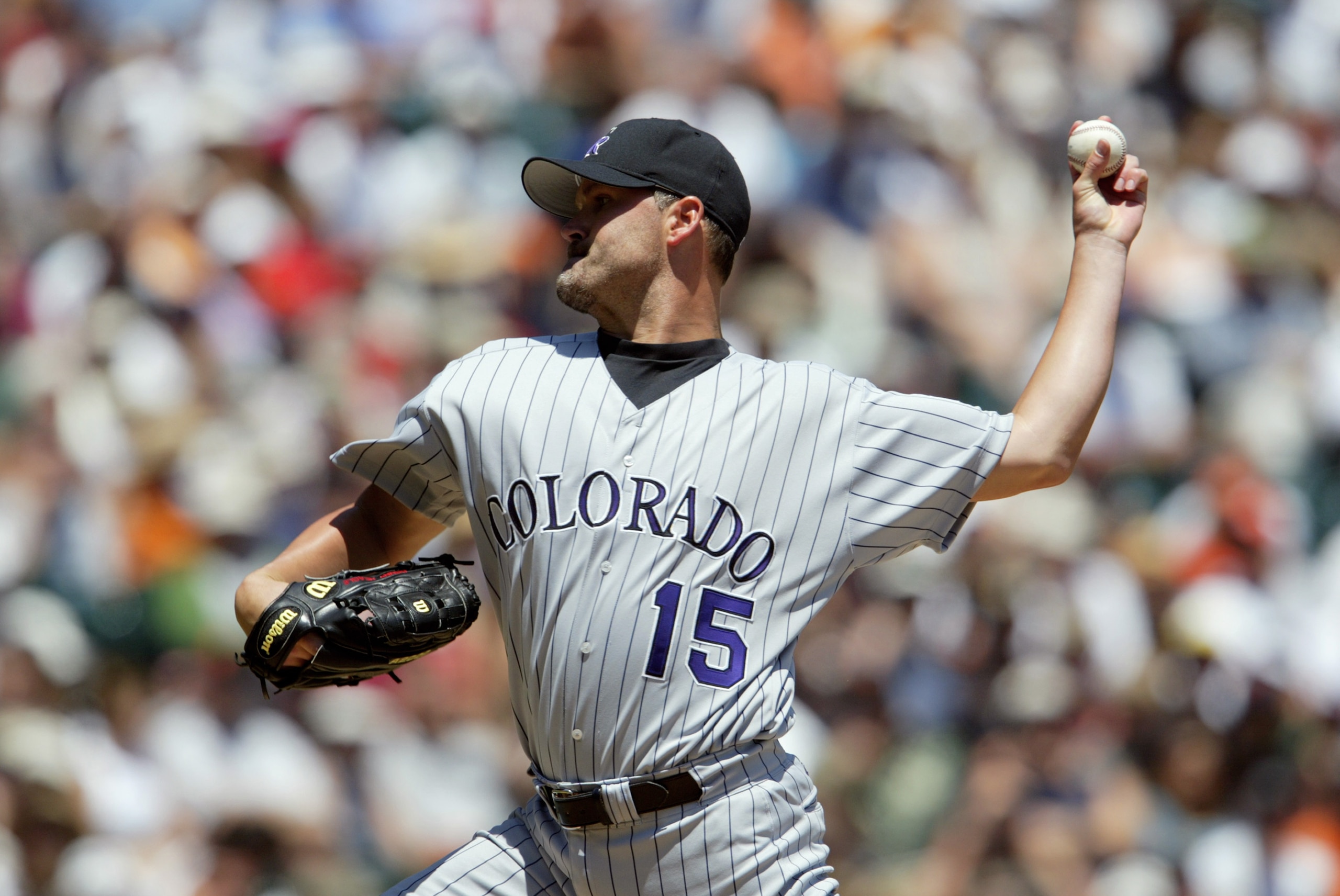 SAN FRANCISCO - JULY 20: Starting pitcher Denny Neagle #15 of the Colorado Rockies delivers a pitch during the National League game against the San Francisco Giants at Pacific Bell Park on July 20, 2003 in San Francisco, California. The Giants defeated SAN FRANCISCO - JULY 20: Starting pitcher Denny Neagle #15 of the Colorado Rockies delivers a pitch during the National League game against the San Francisco Giants at Pacific Bell Park on July 20, 2003 in San Francisco, California. The Giants defeated