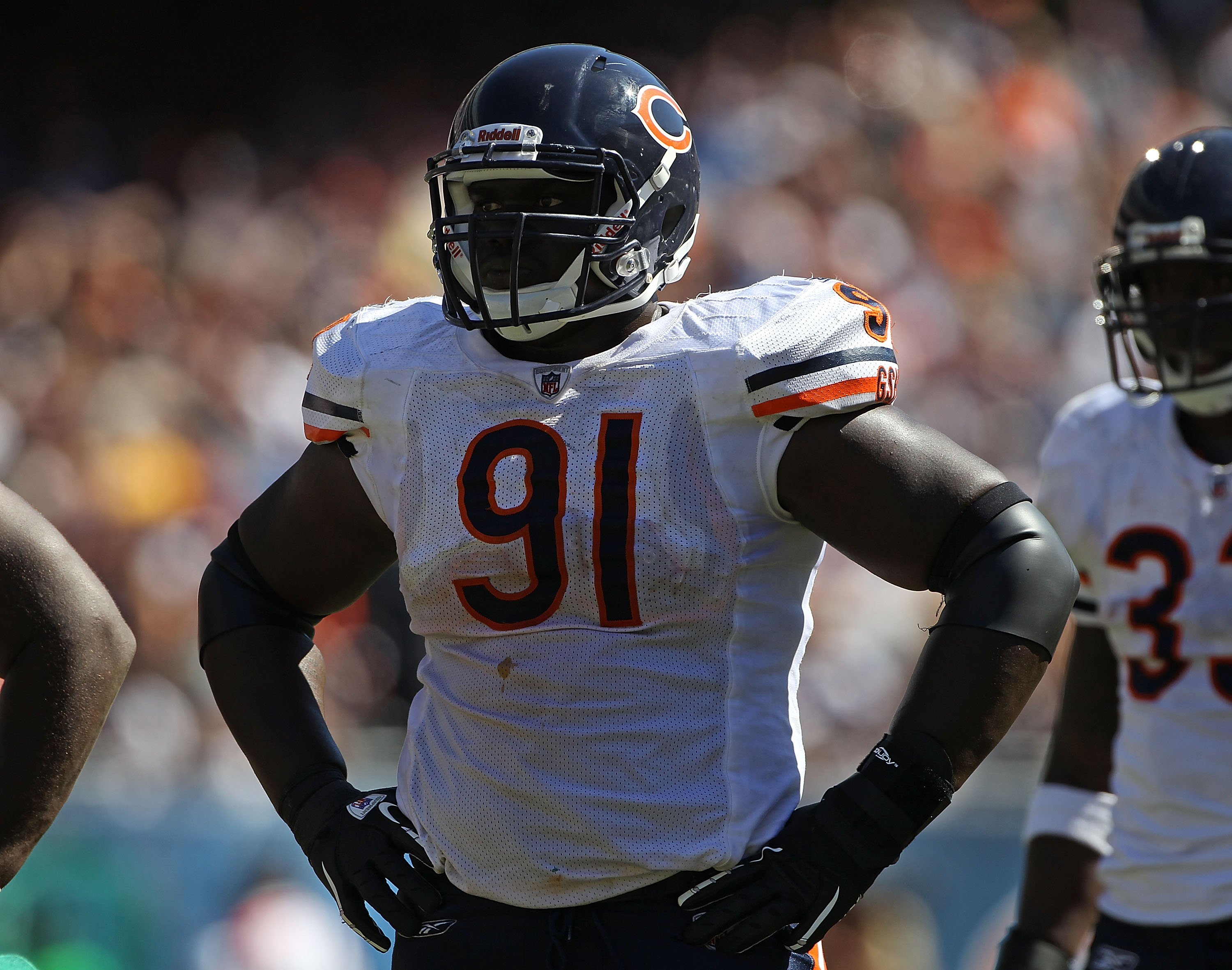 CHICAGO - SEPTEMBER 12: Tommie Harris #91 of the Chicago Bears awaits the start of play against the Detroit Lions during the NFL season opening game at Soldier Field on September 12, 2010 in Chicago, Illinois. The Bears defeated the Lions 19-14. (Photo by