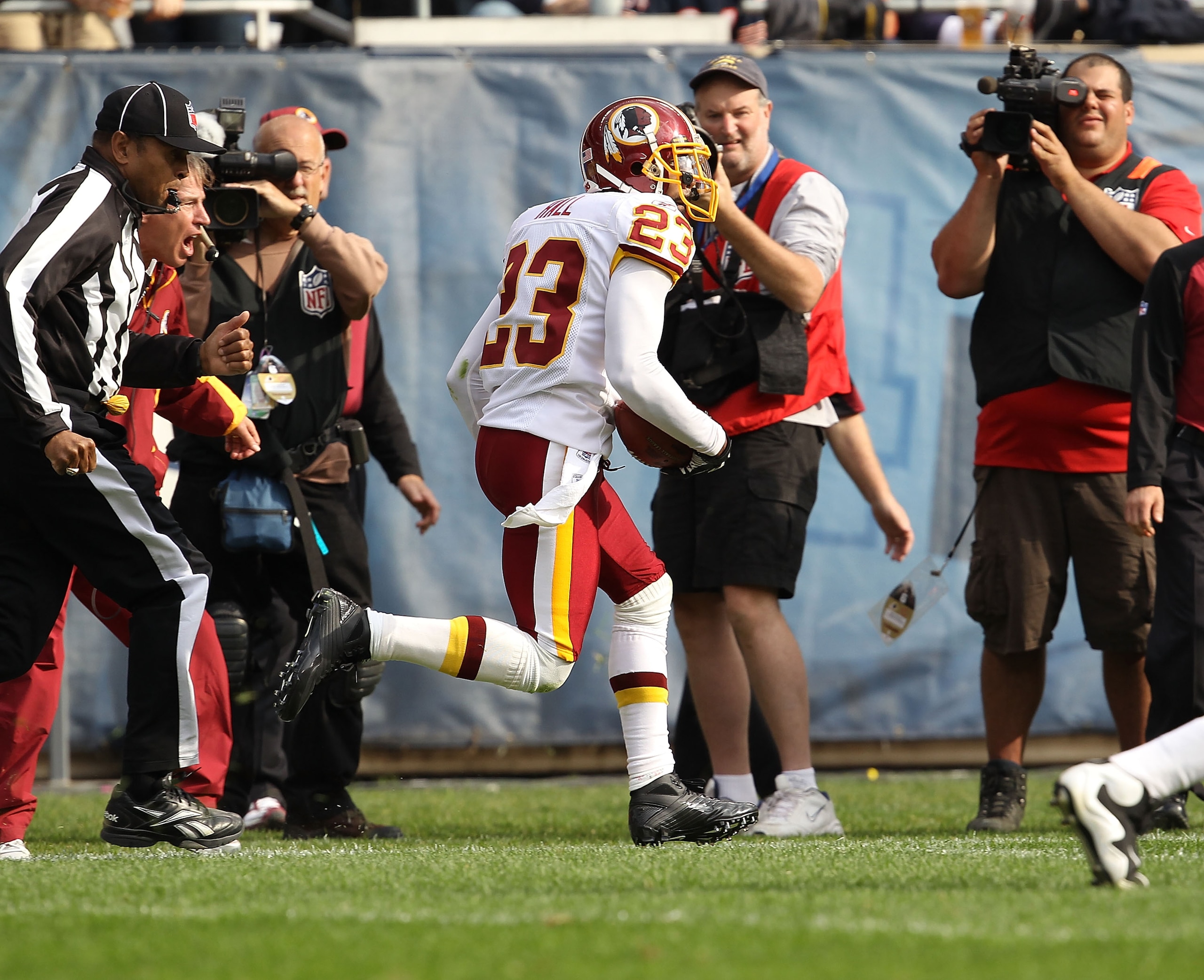 CHICAGO - OCTOBER 24: DeAngelo Hall #23 returns an interception 92 yards for a touchdown against the Chicago Bears at Soldier Field on October 24, 2010 in Chicago, Illinois. The Redskins defeated the Bears 17-14. (Photo by Jonathan Daniel/Getty Images)