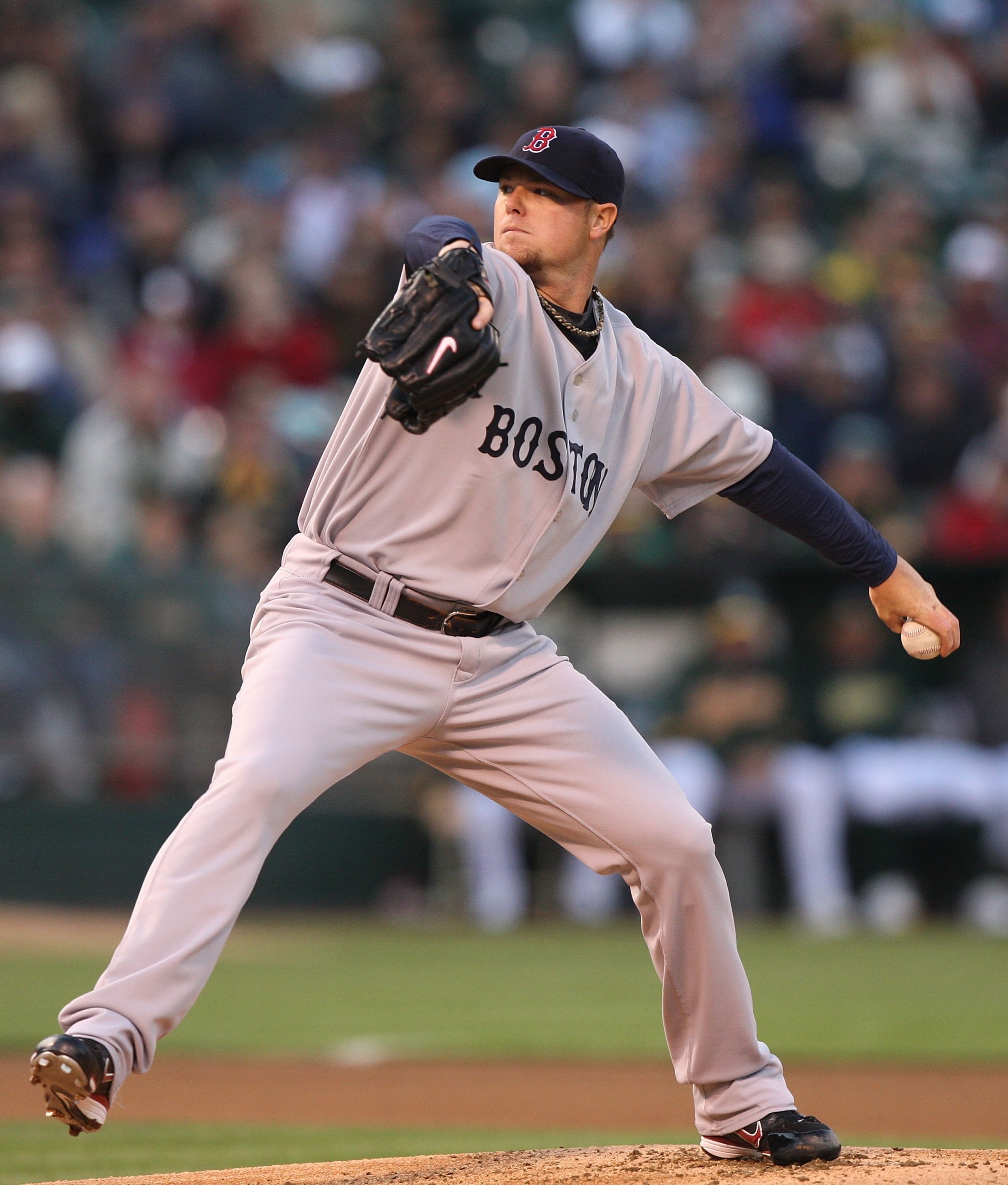 OAKLAND, CA - APRIL 13:  John Lester #31 of the Boston Red Sox pitches against the Oakland Athletics during a Major League Baseball game on April 13, 2009 at the Oakland Coliseum in Oakland, California.  (Photo by Jed Jacobsohn/Getty Images)