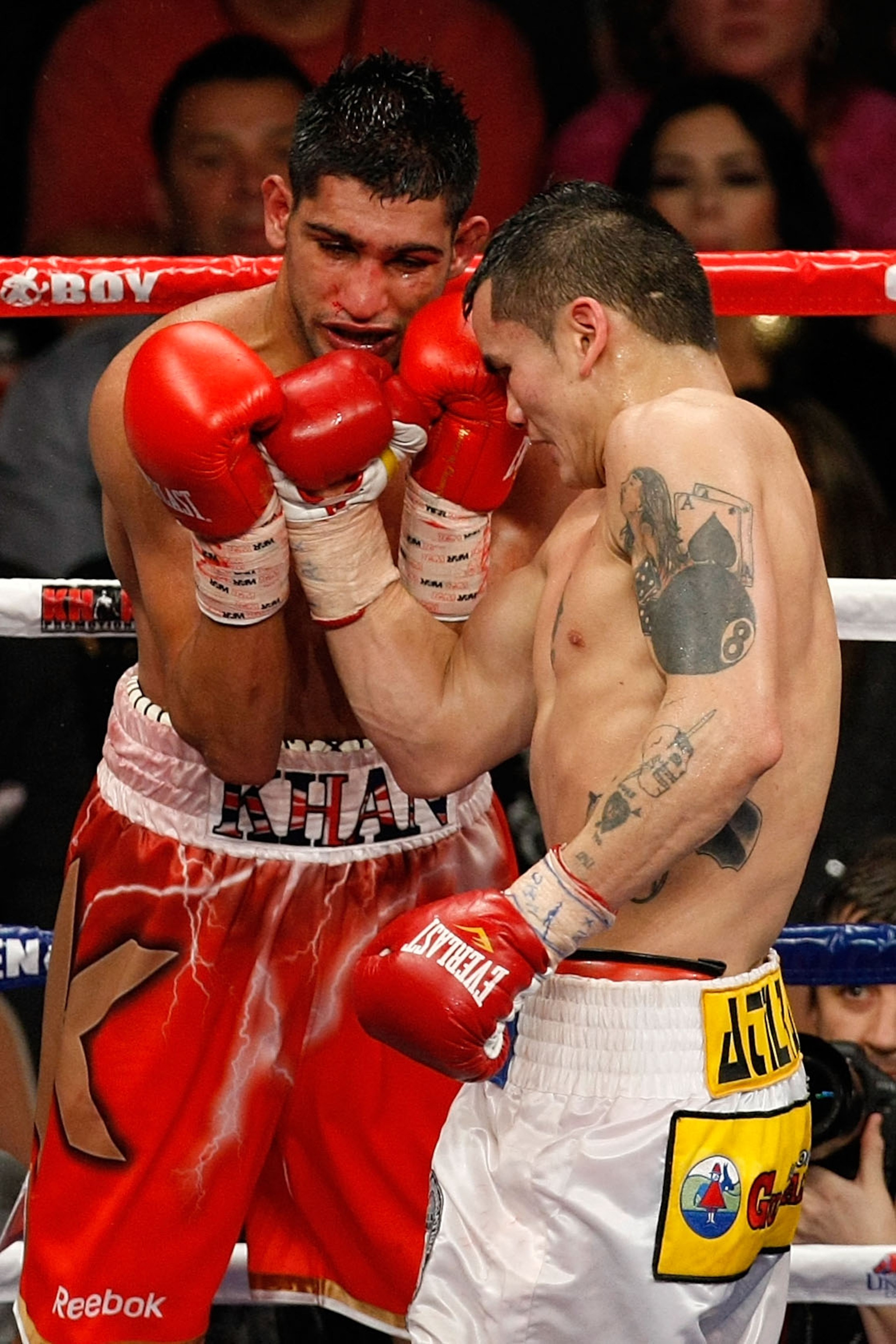 LAS VEGAS - DECEMBER 11:  (R-L) Marcos Maidana of Argentina connects with a right at Amir Khan of England during the WBA super lightweight title fight at Mandalay Bay Events Center on December 11, 2010 in Las Vegas, Nevada.  (Photo by Ethan Miller/Getty I