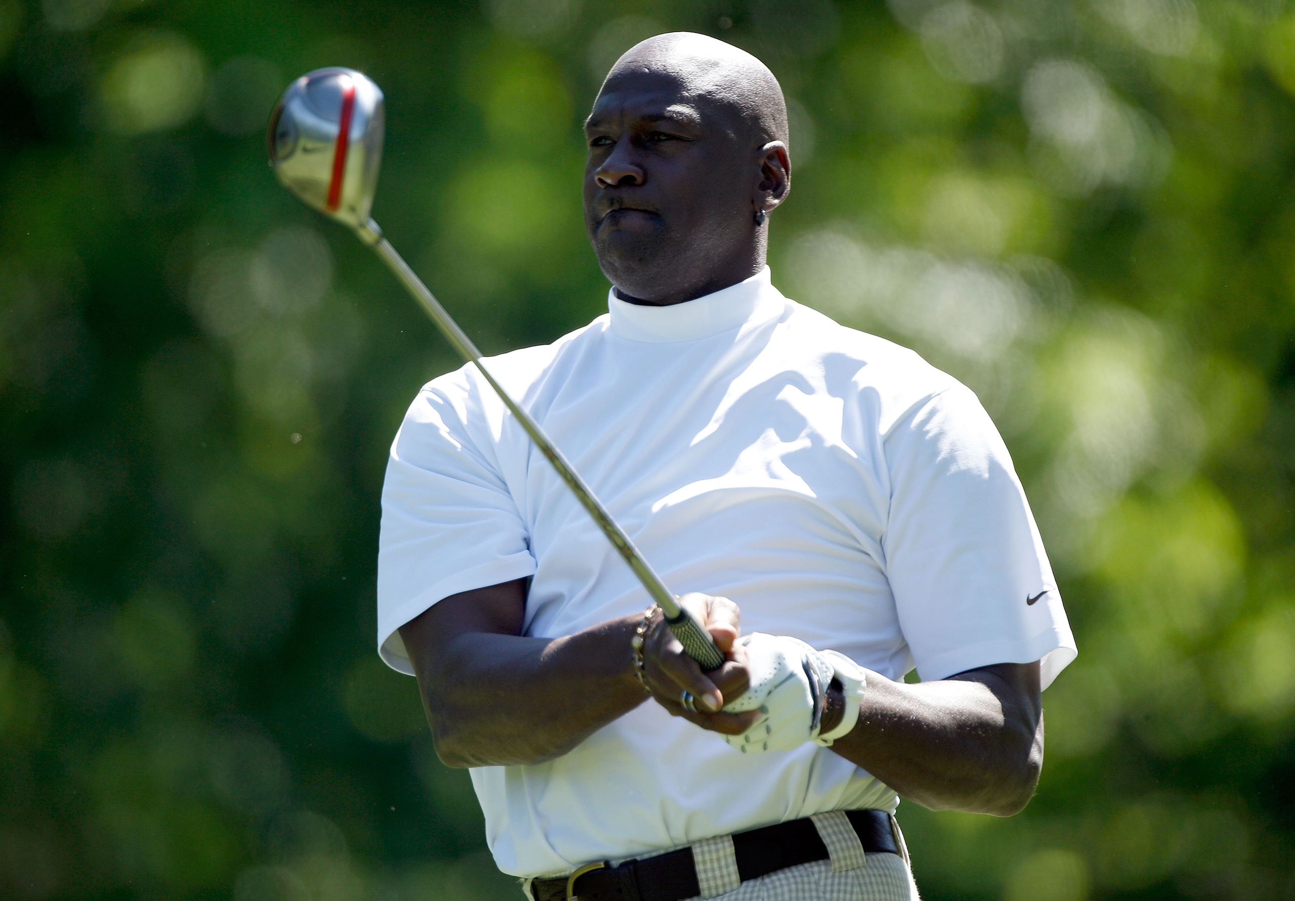 CHARLOTTE, NC - APRIL 28:  Basketball legend Michael Jordan hits a shot during the pro am prior to the start of the 2010 Quail Hollow Championship at the Quail Hollow Club on April 28, 2010 in Charlotte, North Carolina.  (Photo by Scott Halleran/Getty Ima